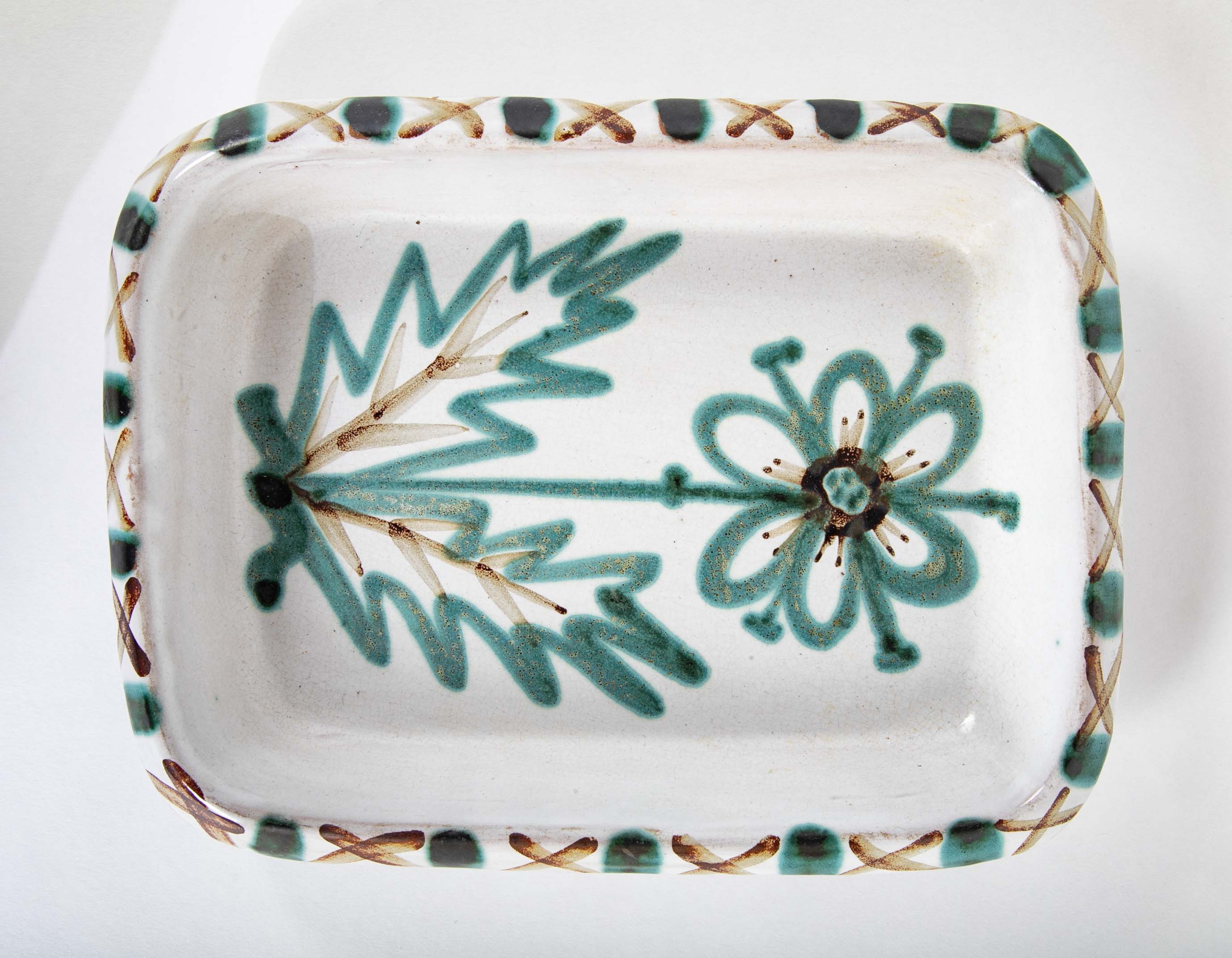 Pair of Ceramic Dishes with Center Flower on White by Robert Picault