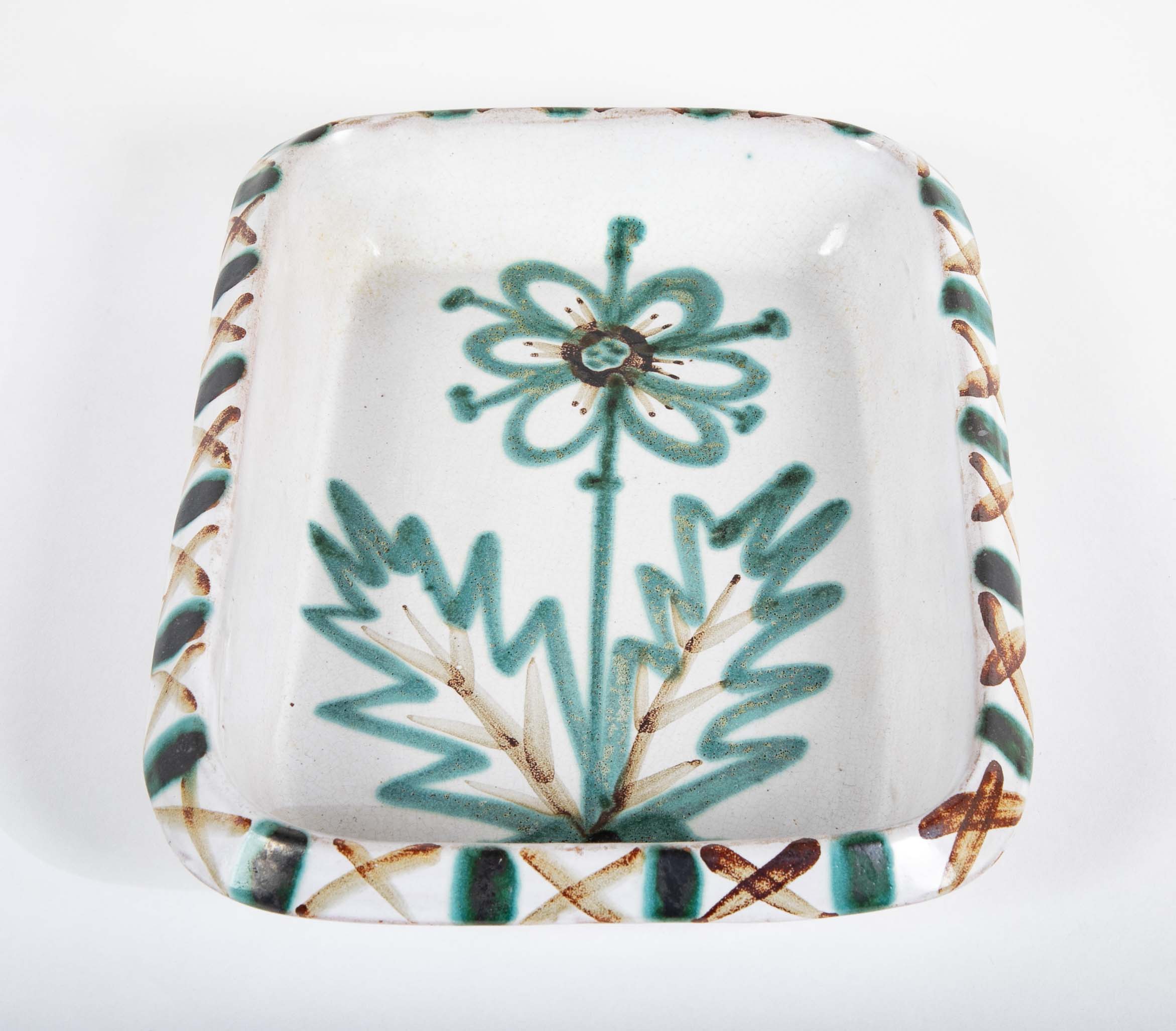 Pair of Ceramic Dishes with Center Flower on White by Robert Picault