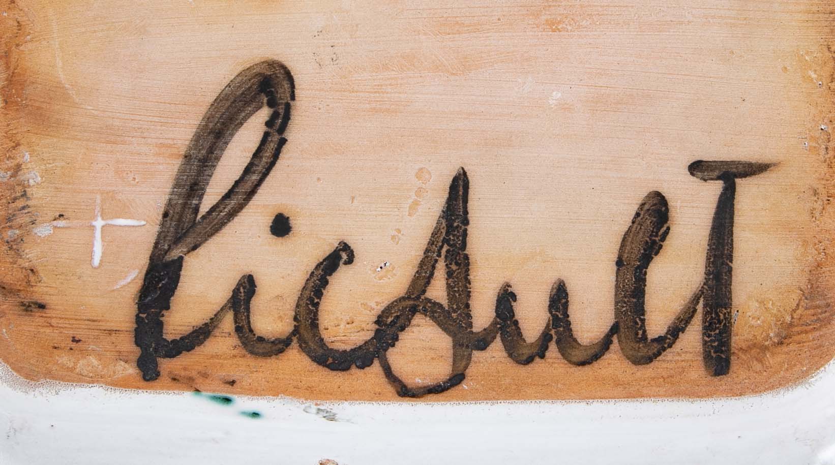 Pair of Ceramic Dishes with Center Flower on White by Robert Picault