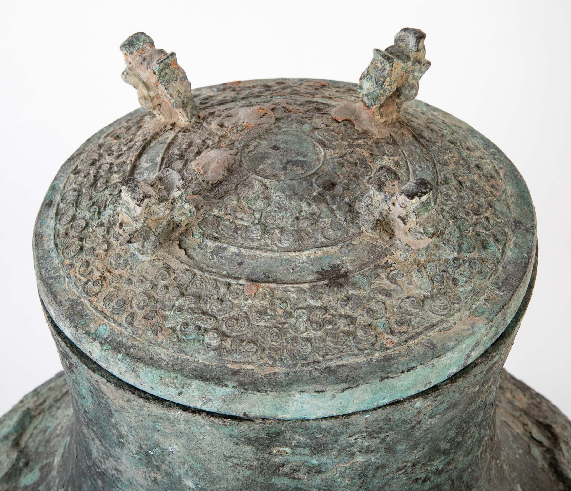 A Pair of Chinese "Warring States" Period Bronze Lidded Wine Vessels