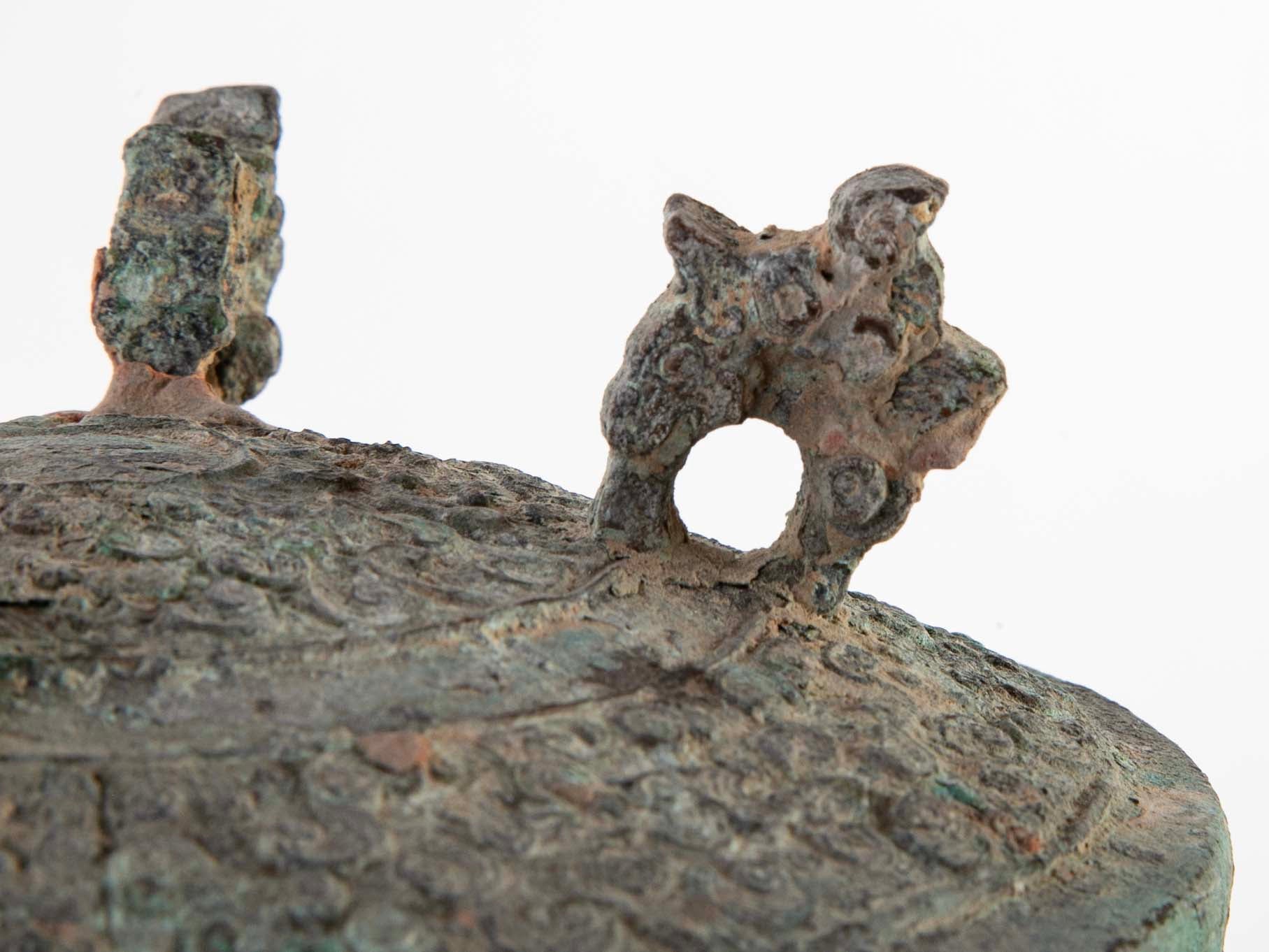 A Pair of Chinese "Warring States" Period Bronze Lidded Wine Vessels