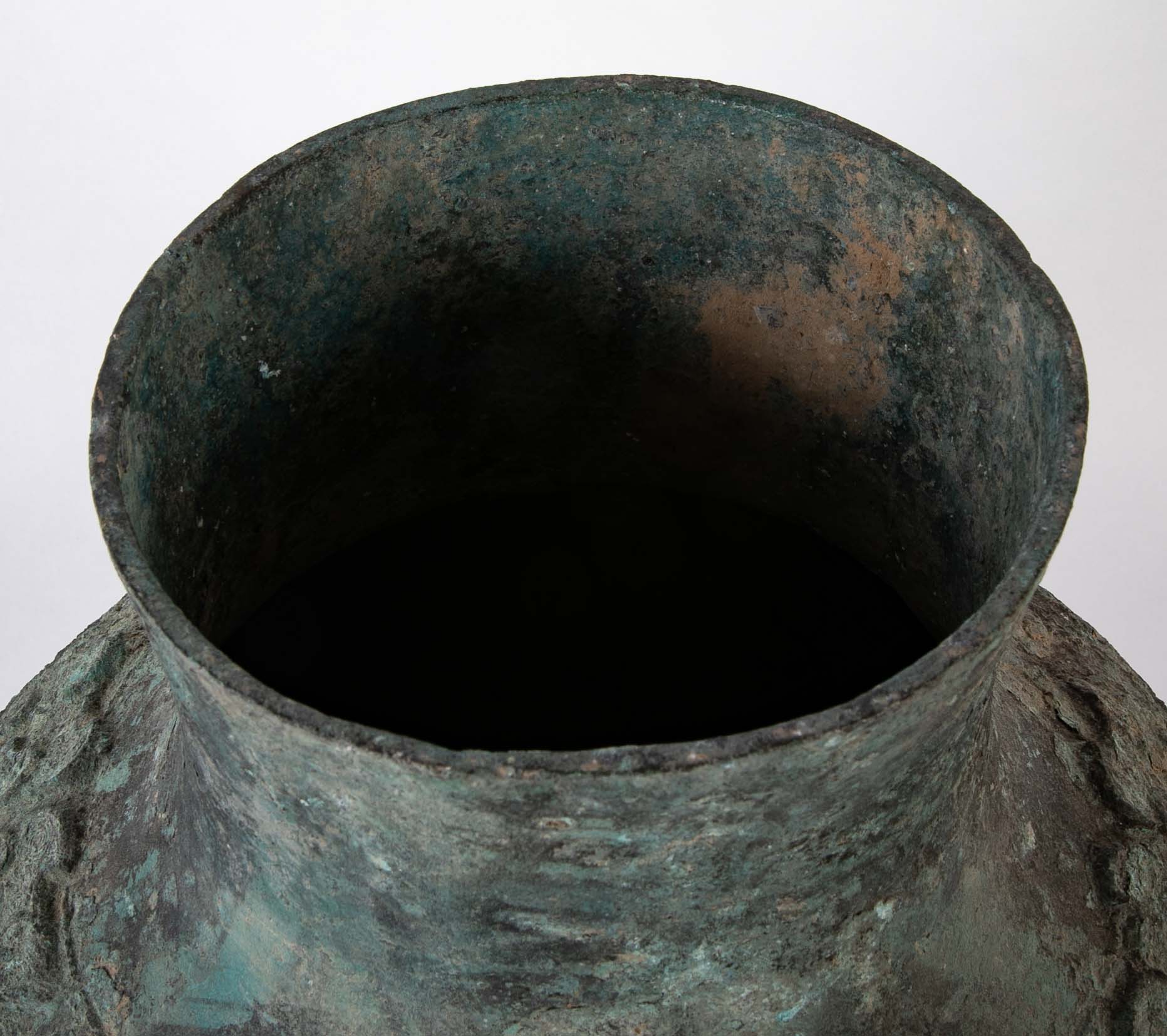 A Pair of Chinese "Warring States" Period Bronze Lidded Wine Vessels