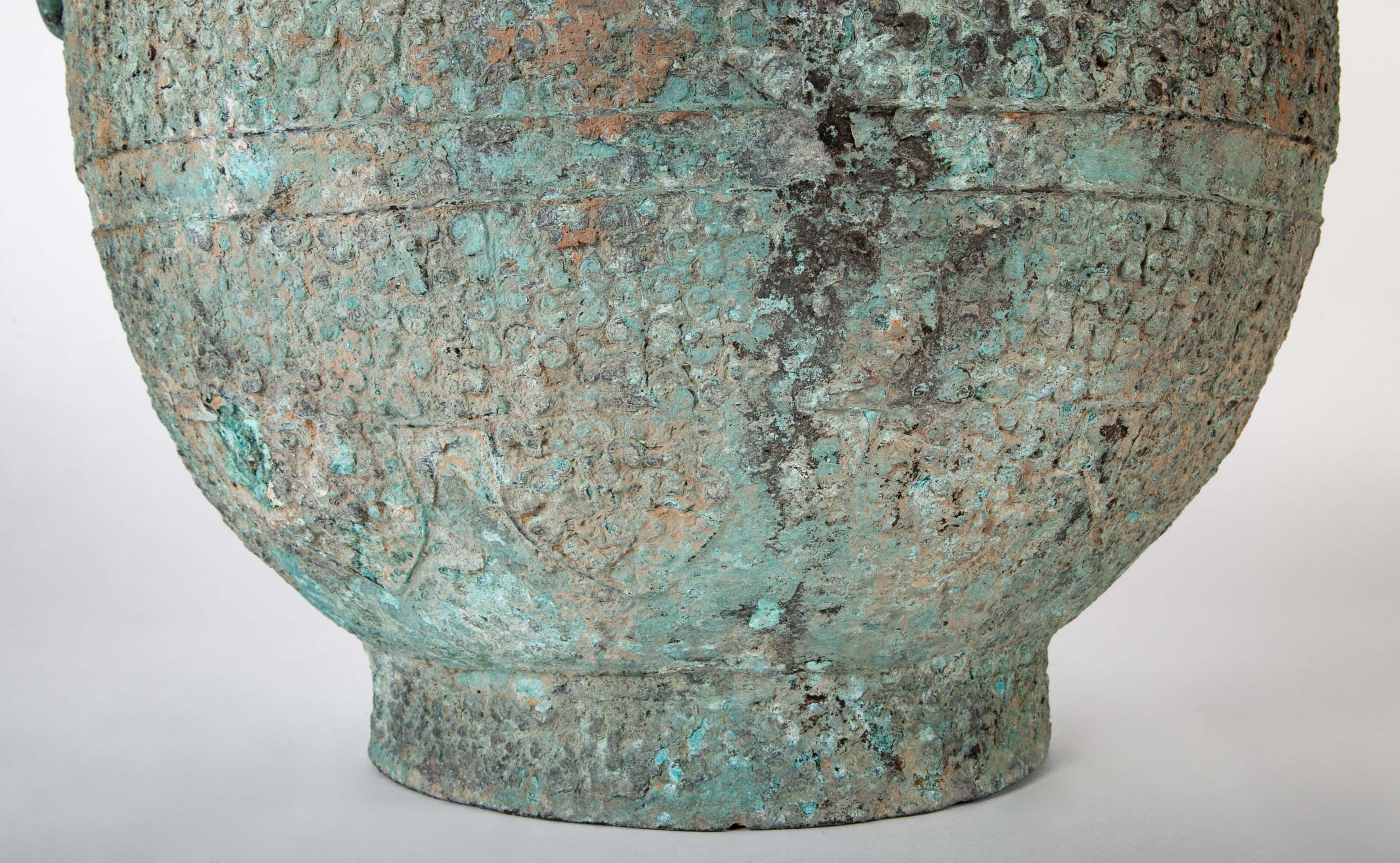 A Pair of Chinese "Warring States" Period Bronze Lidded Wine Vessels