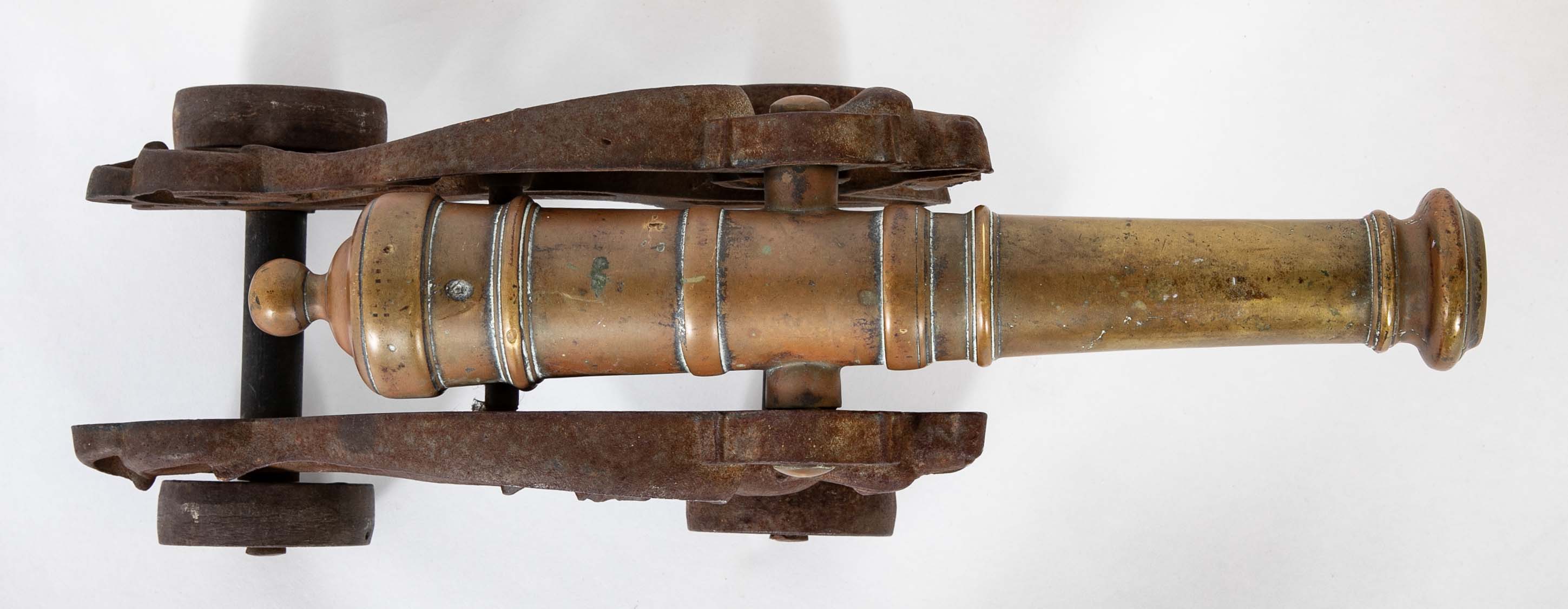 An 18th Century Bronze Cannon Barrel on 19th Century Dragon Shaped Base