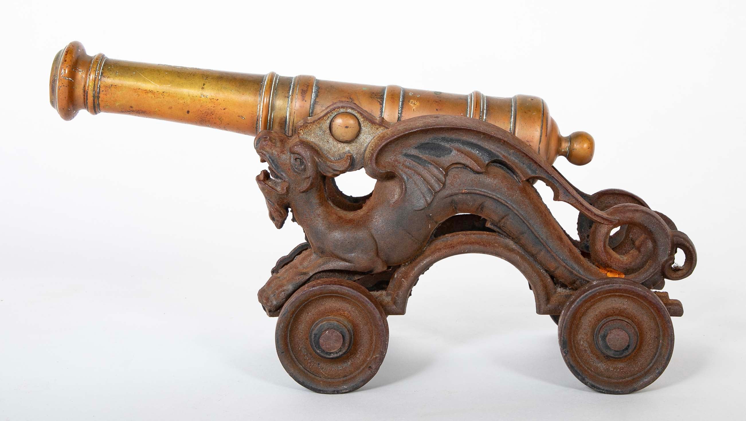 An 18th Century Bronze Cannon Barrel on 19th Century Dragon Shaped Base