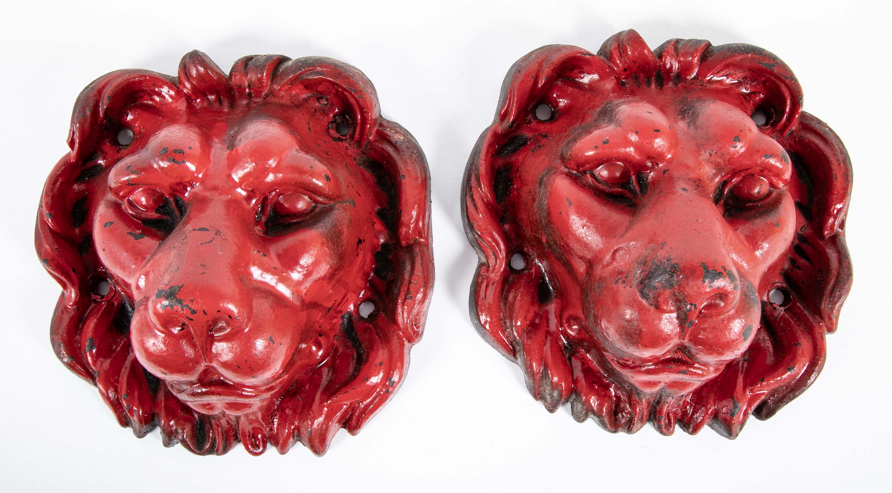 Pair of Red Painted Cast Iron Lion Head Wall Mounts
