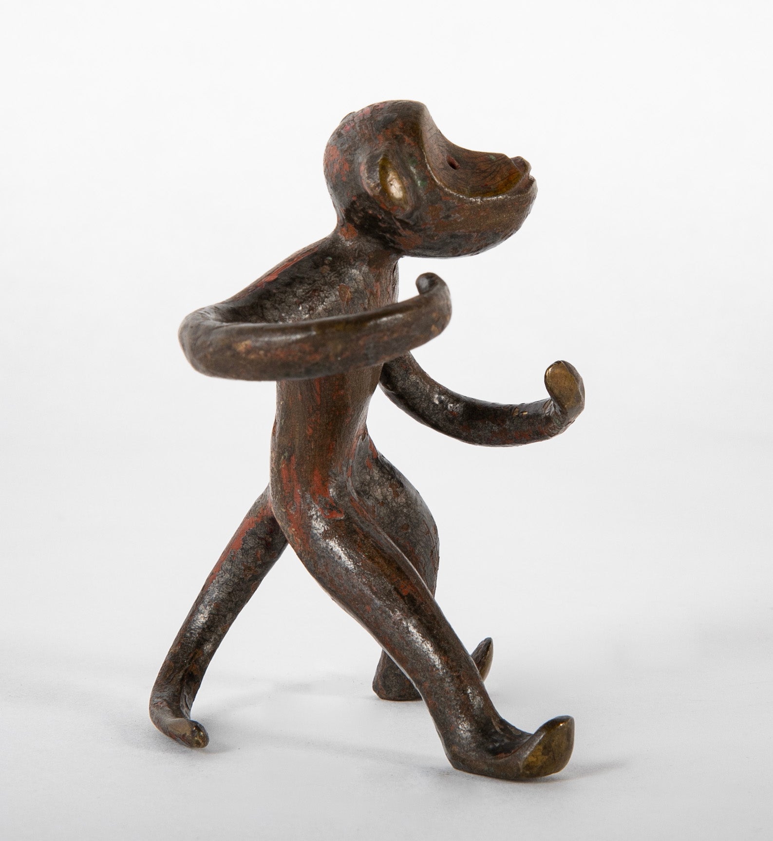 A Bronze of a Monkey Retaining Original Red Paint