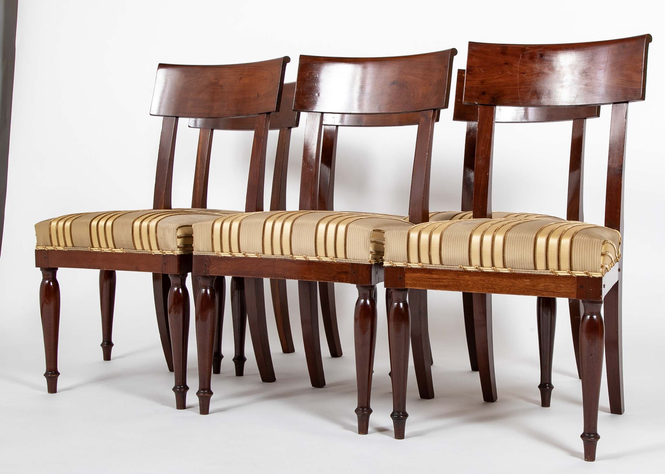 A Rare Set of 12 Restauration / Empire Dining Chairs of Classic Design