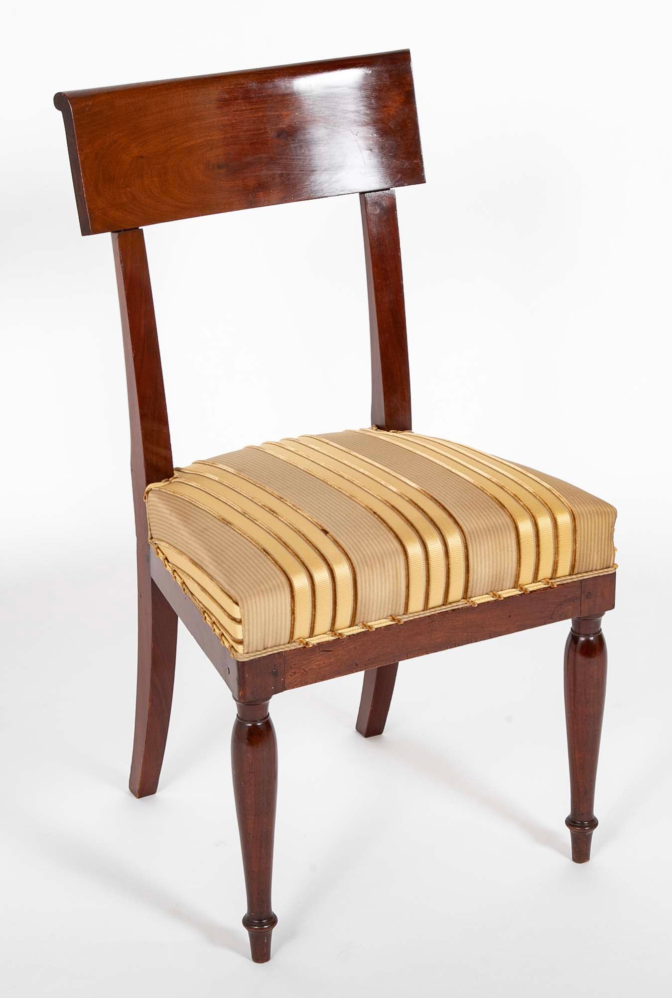 A Rare Set of 12 Restauration / Empire Dining Chairs of Classic Design