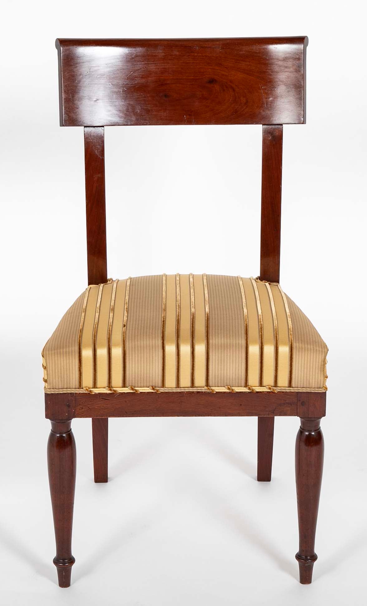 A Rare Set of 12 Restauration / Empire Dining Chairs of Classic Design