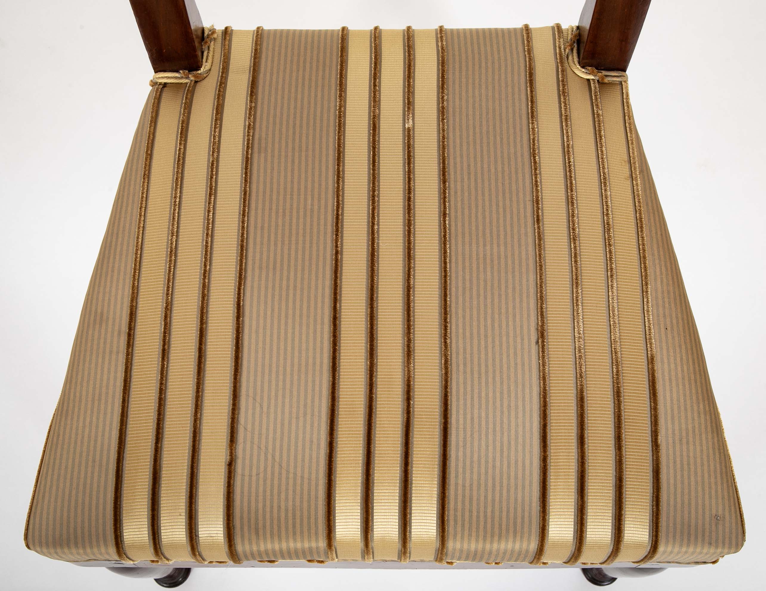 A Rare Set of 12 Restauration / Empire Dining Chairs of Classic Design