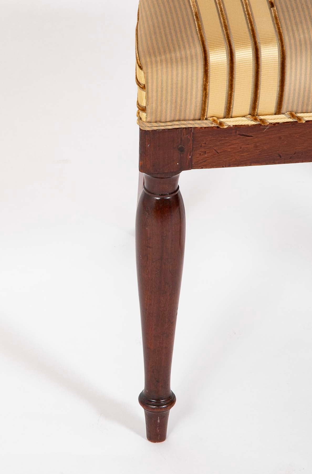 A Rare Set of 12 Restauration / Empire Dining Chairs of Classic Design