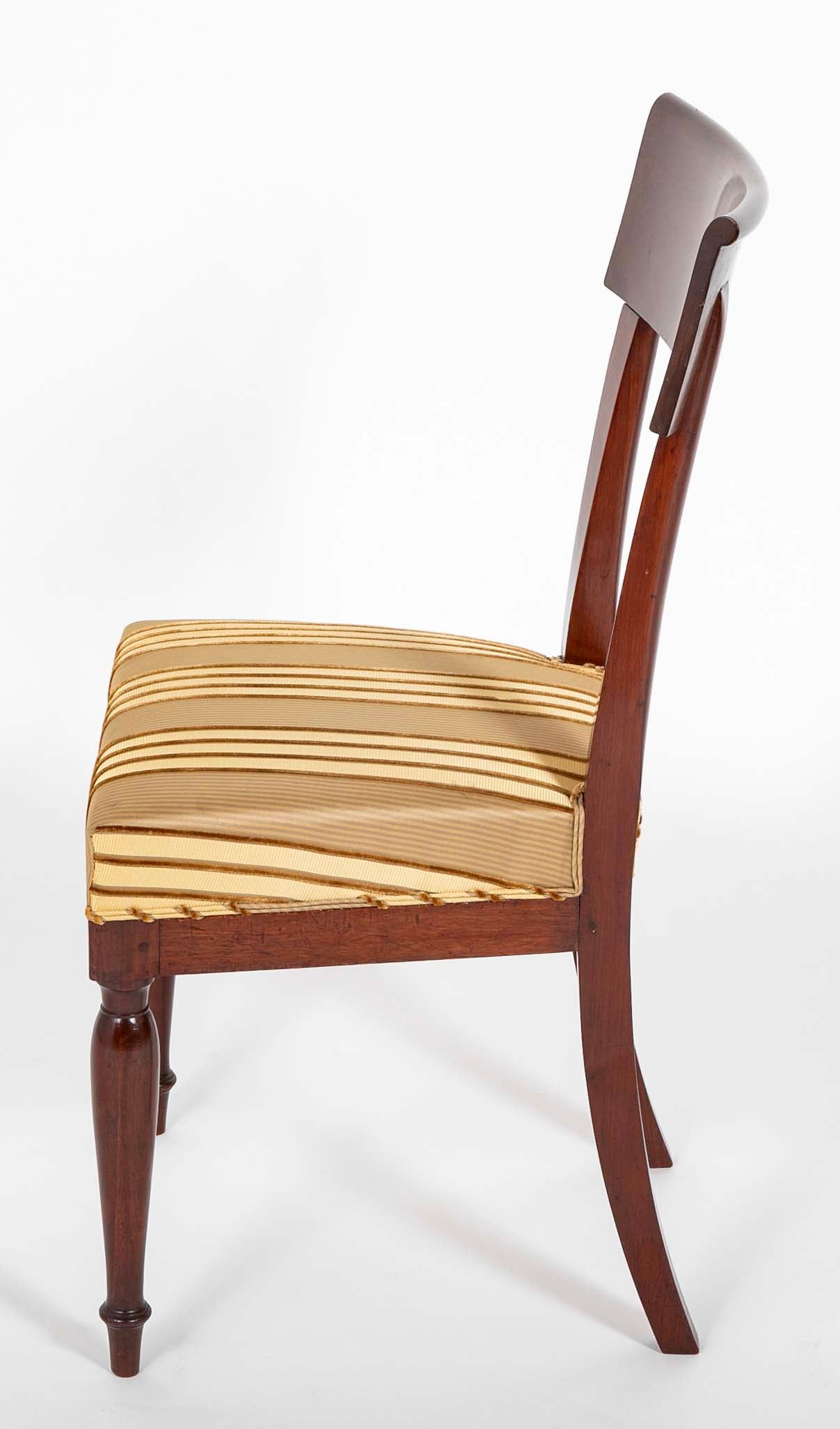 A Rare Set of 12 Restauration / Empire Dining Chairs of Classic Design