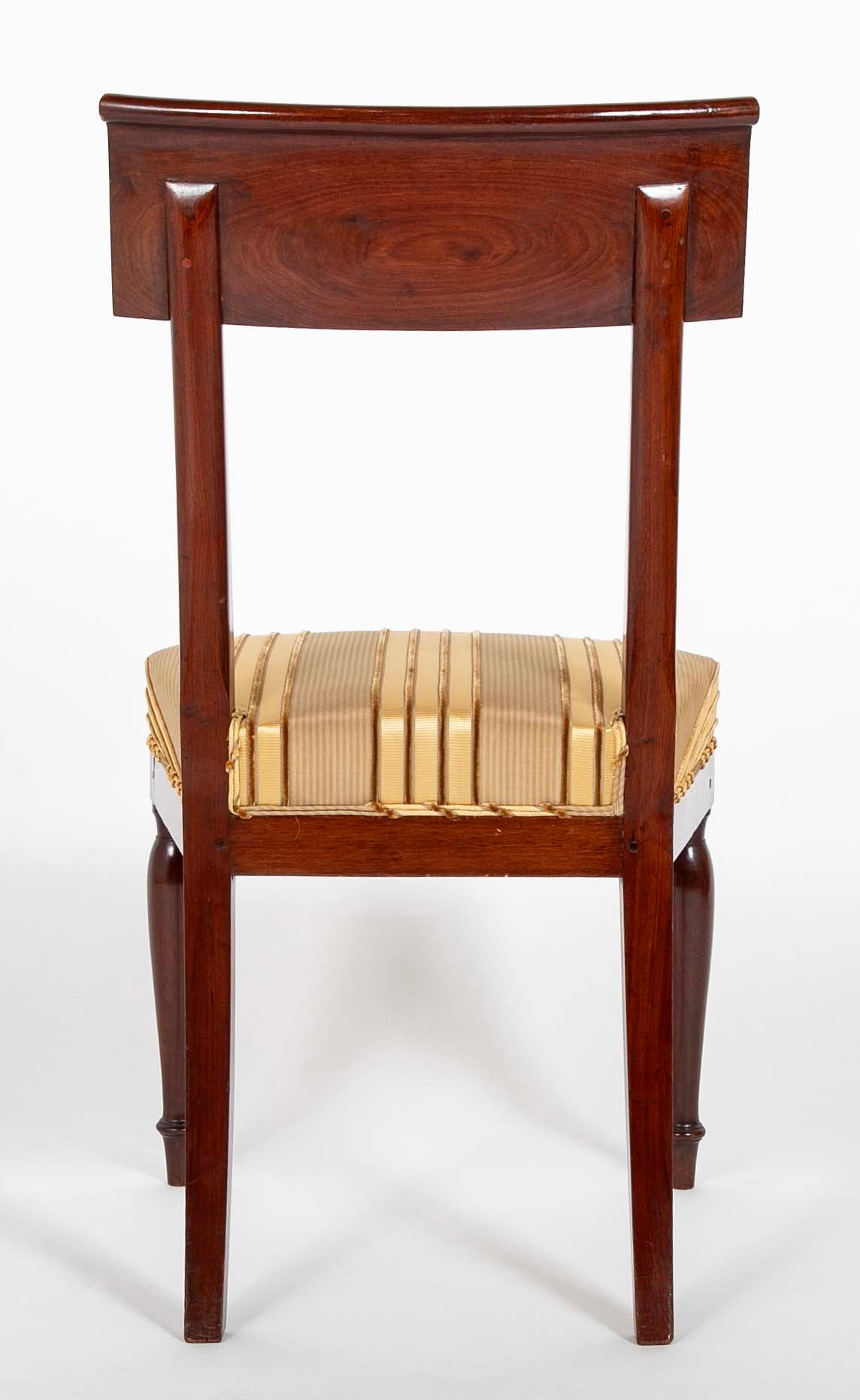 A Rare Set of 12 Restauration / Empire Dining Chairs of Classic Design