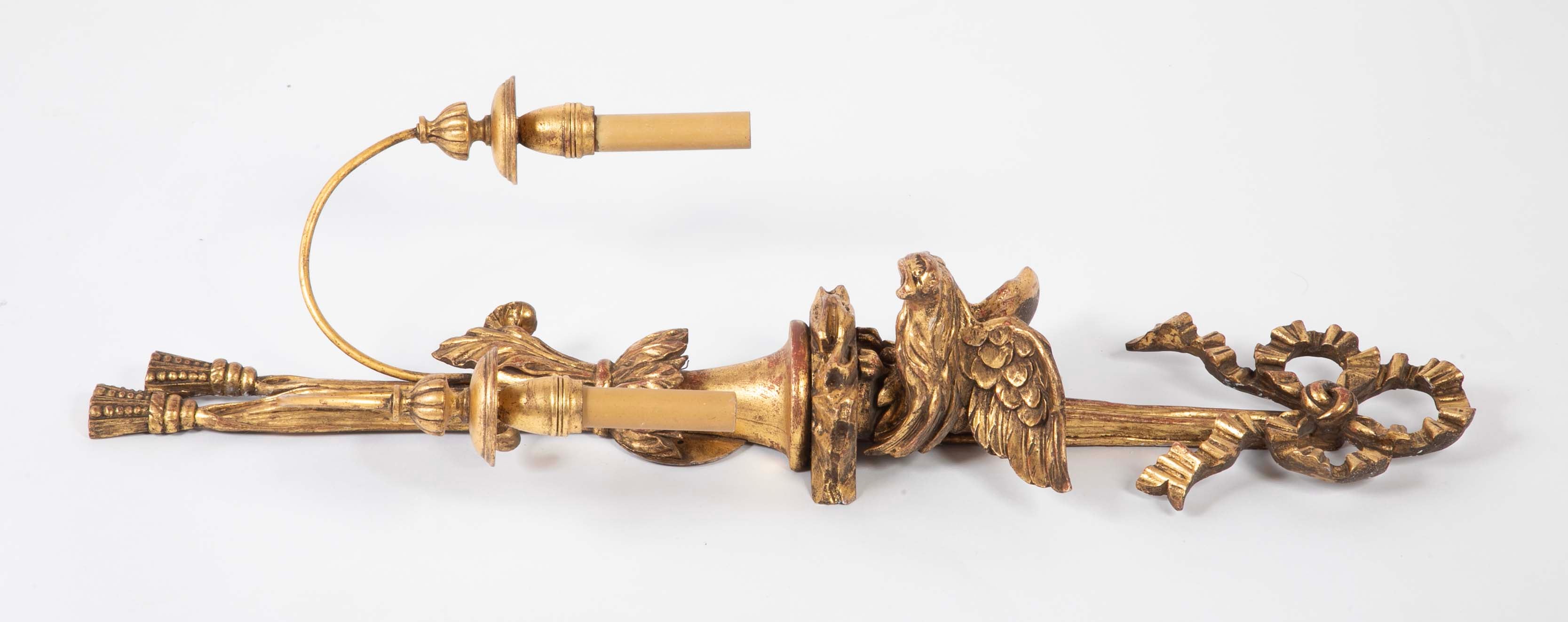 A Pair of Carved and Gilded Two Light Eagle Wall Sconces