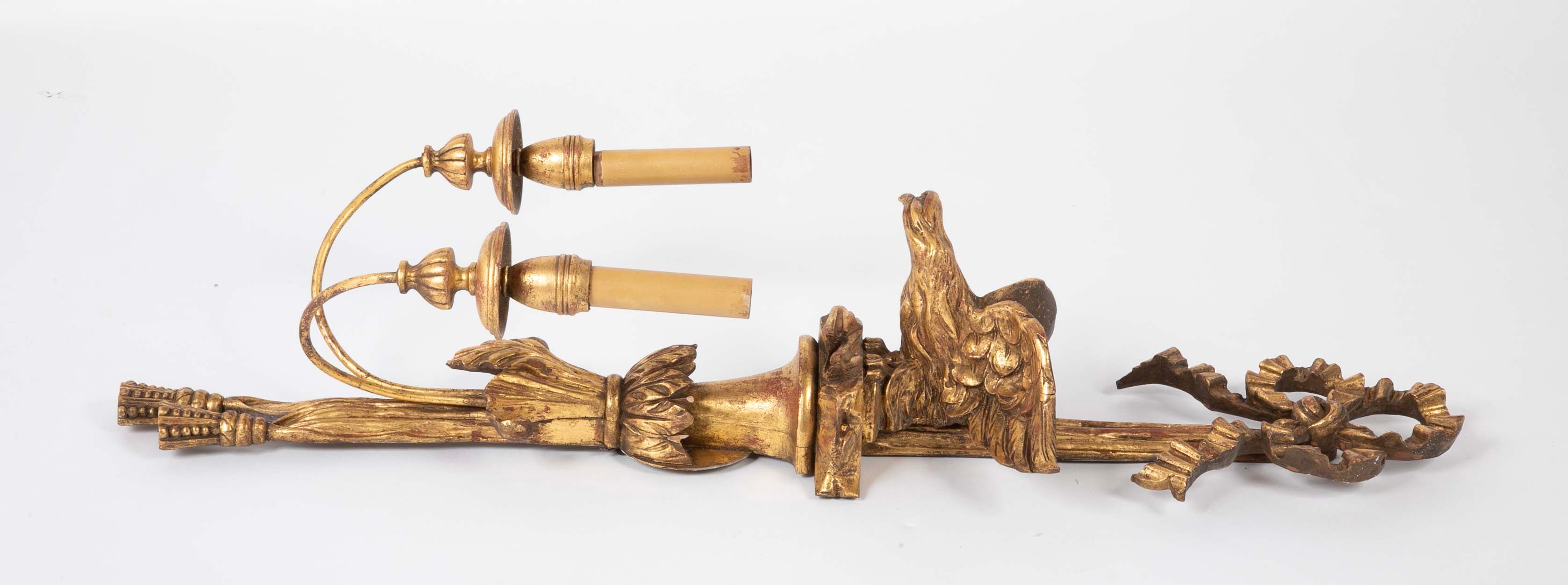 A Pair of Carved and Gilded Two Light Eagle Wall Sconces