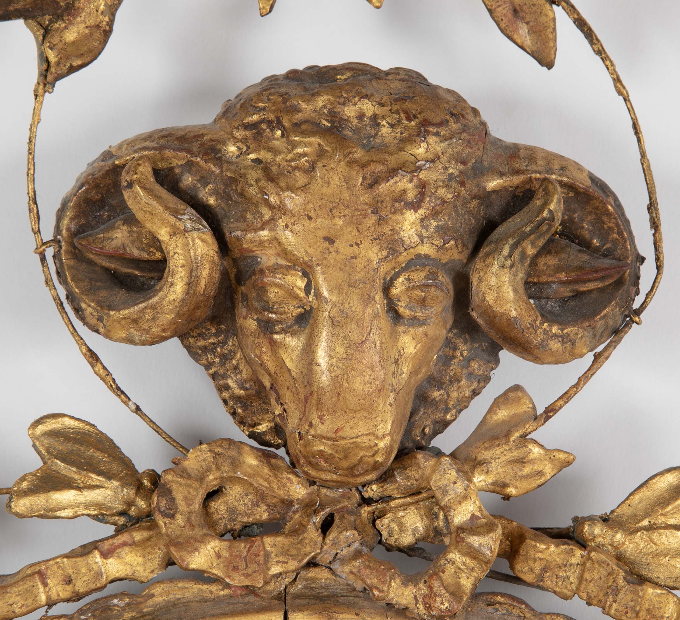 English George III Oval Hepplewhite Gilded Mirror with Ram's Head Surmount
