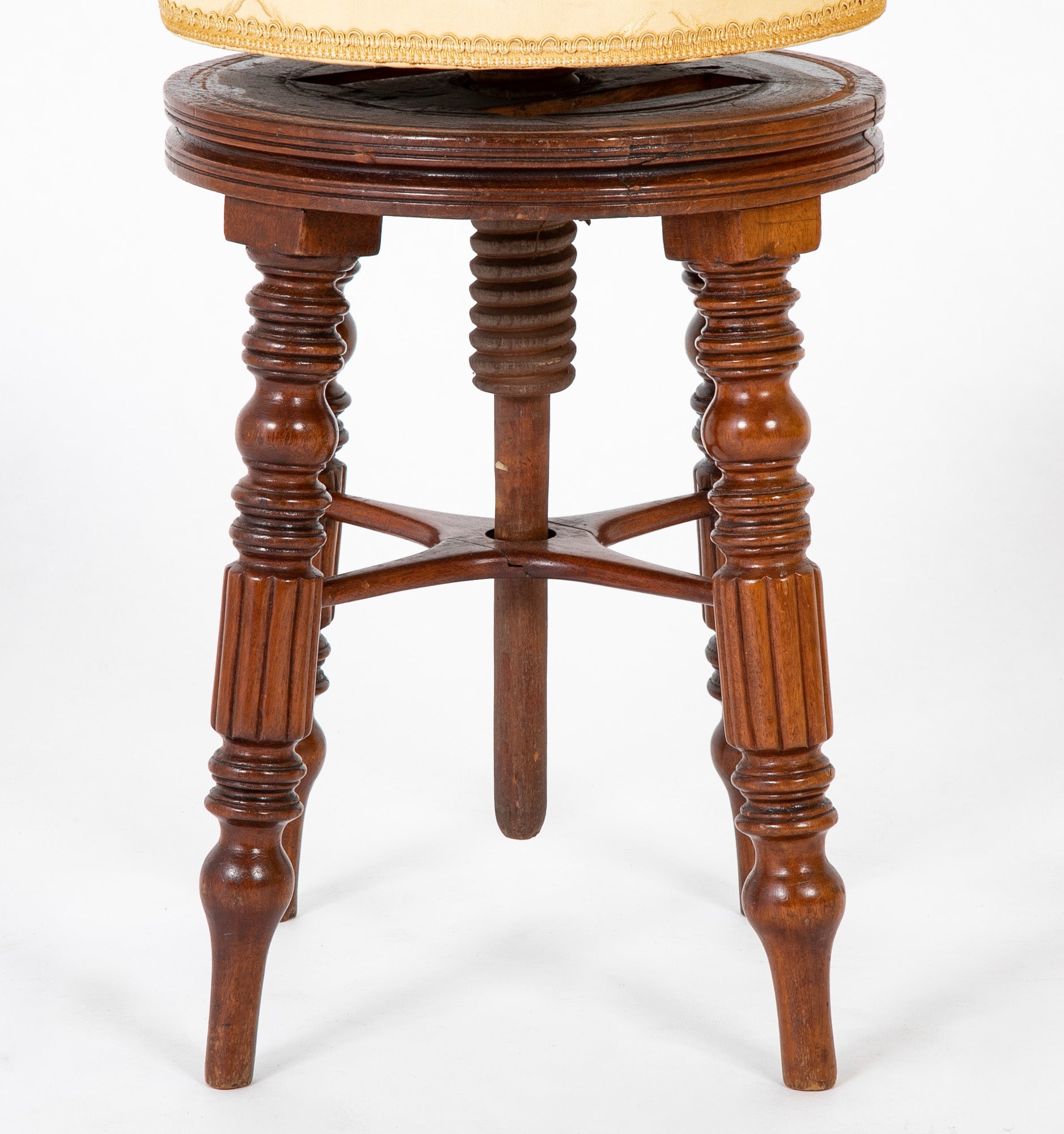 A Regency Reeded Leg Mahogany Revolving Stool