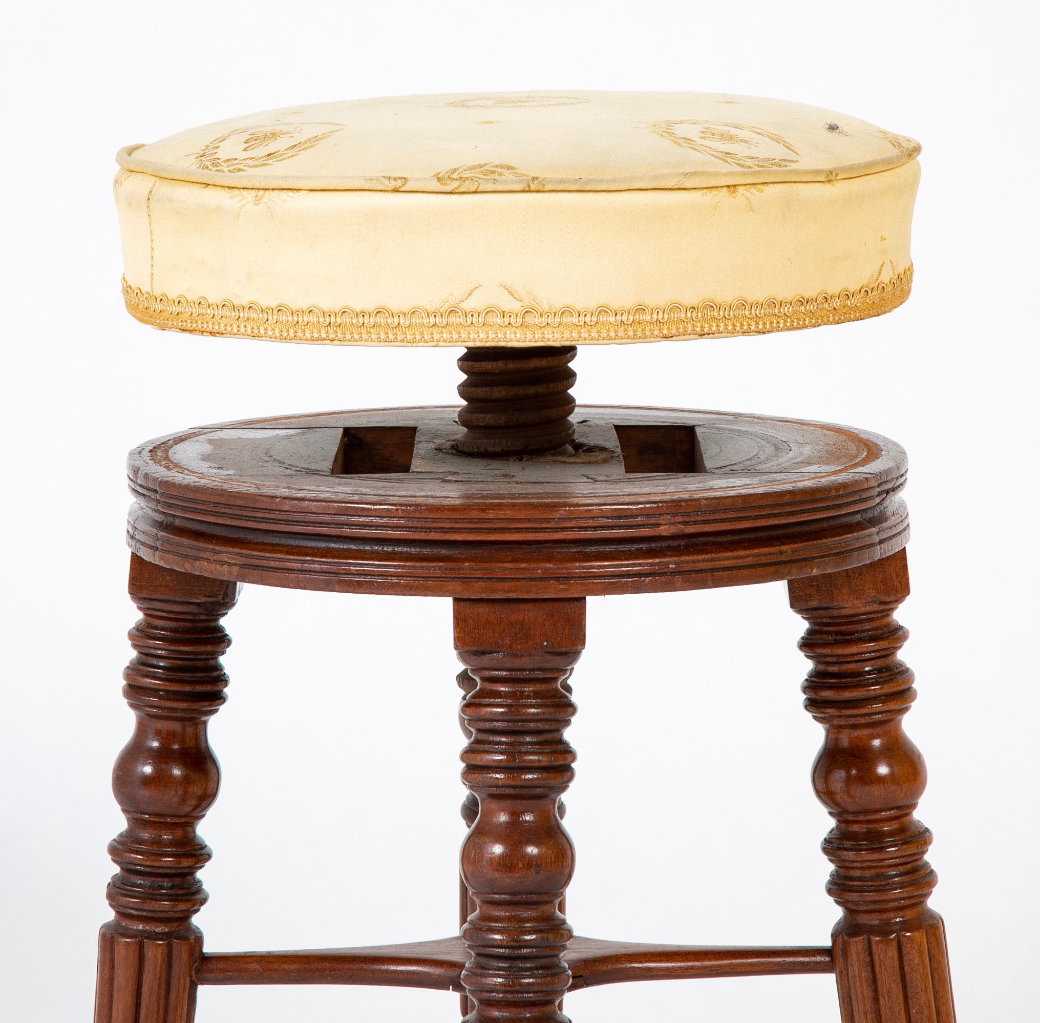 A Regency Reeded Leg Mahogany Revolving Stool