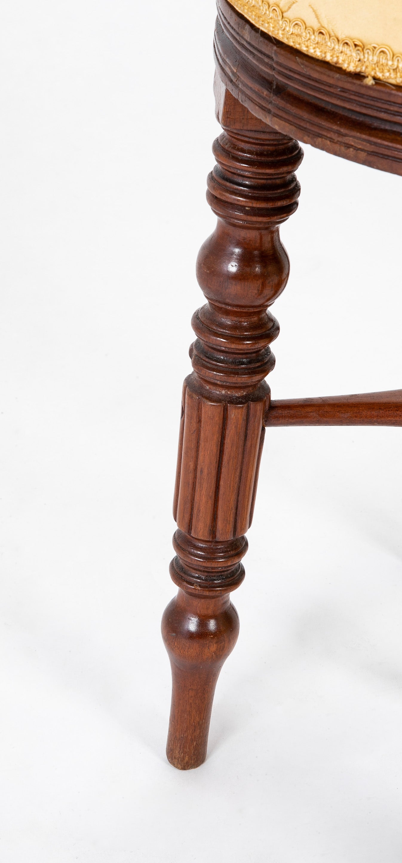 A Regency Reeded Leg Mahogany Revolving Stool