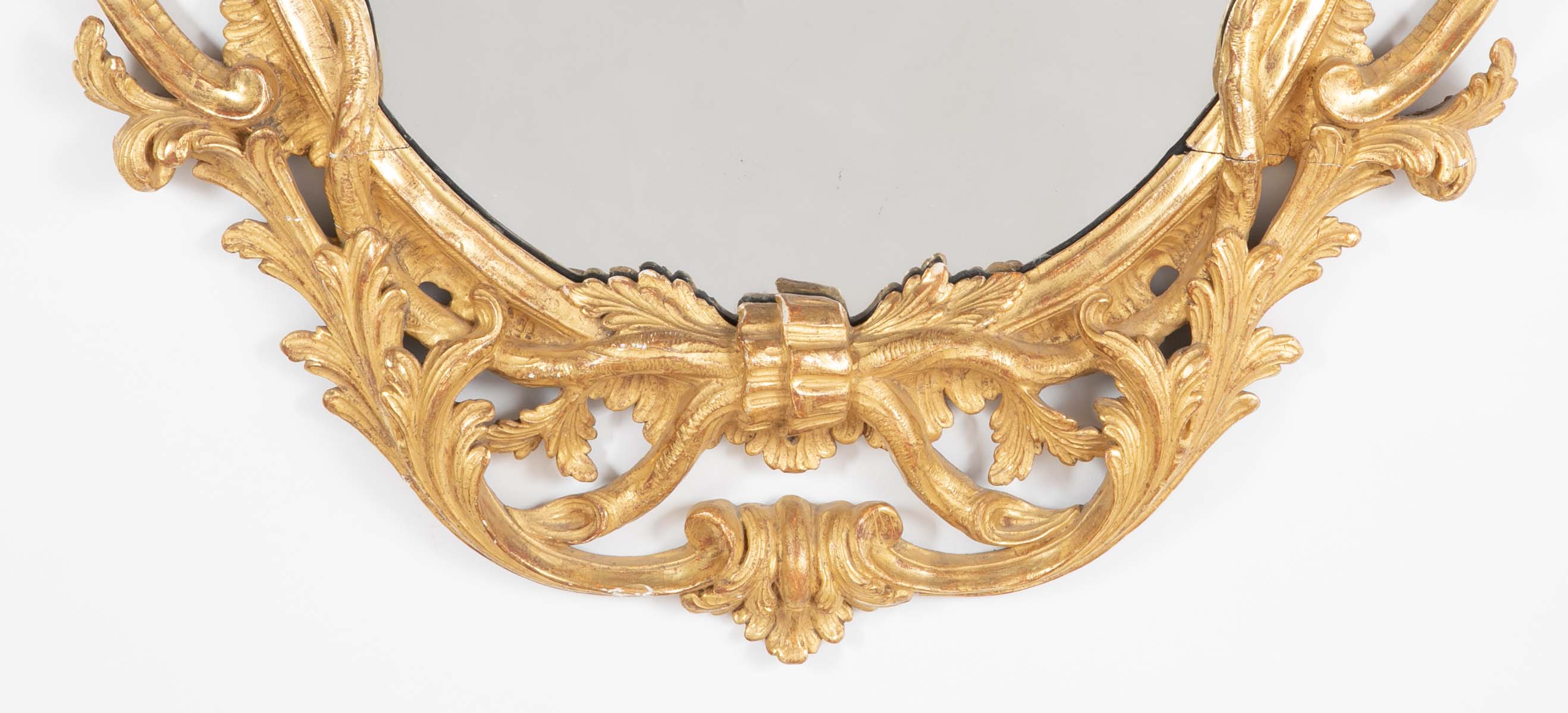 Pair of English George II Period Oval Gilt Mirrors