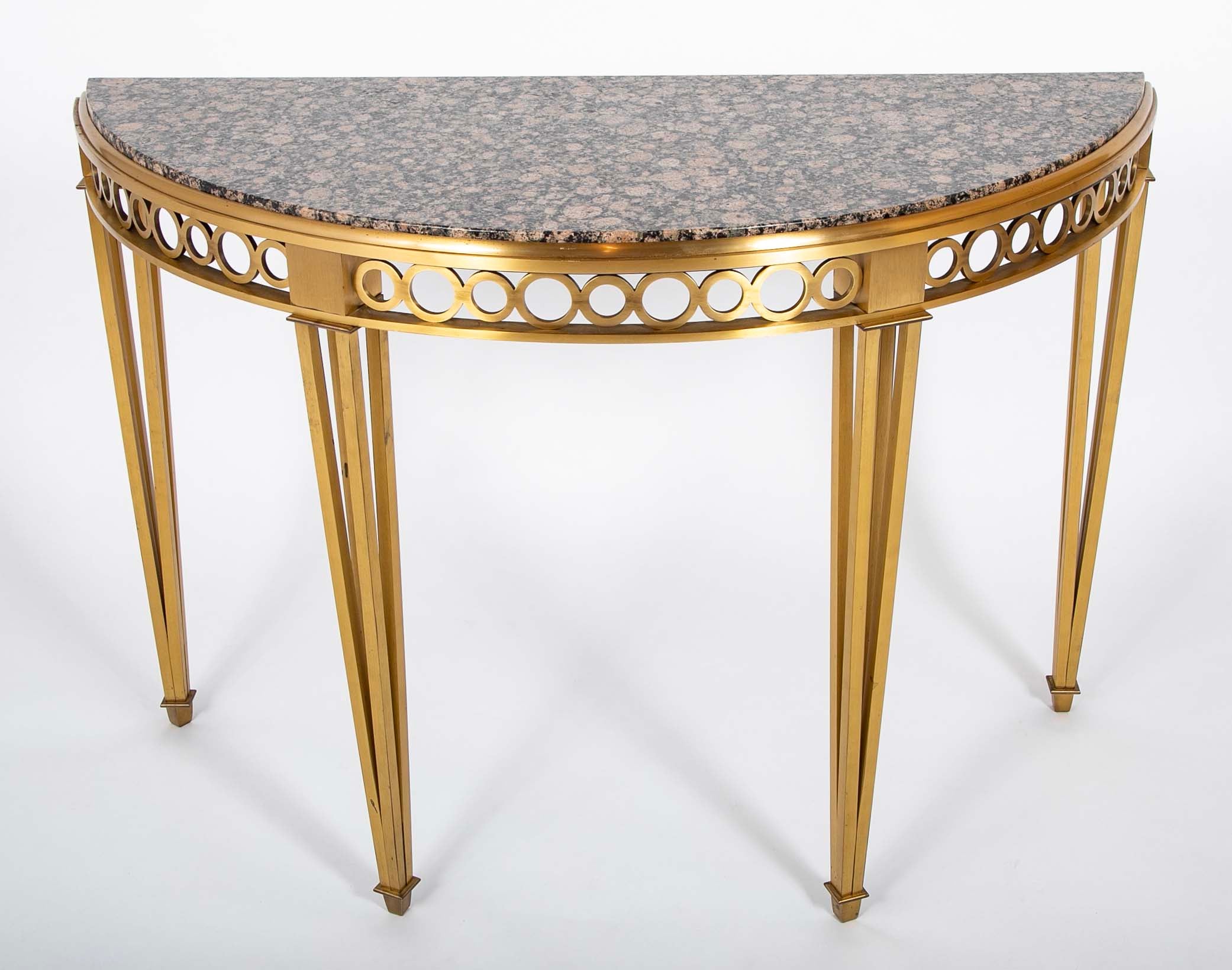 Striking Pair of Bronze Consoles with Fossilized Marble Tops