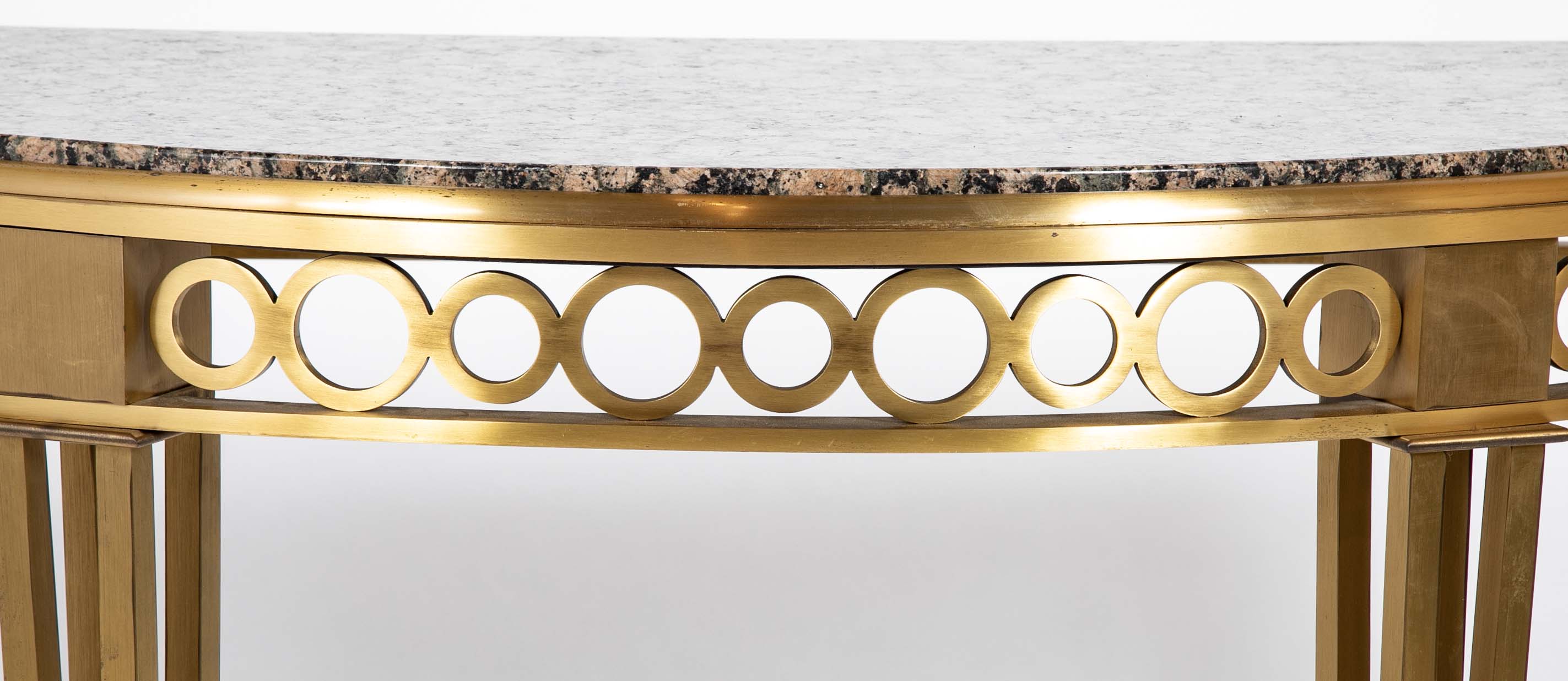 Striking Pair of Bronze Consoles with Fossilized Marble Tops