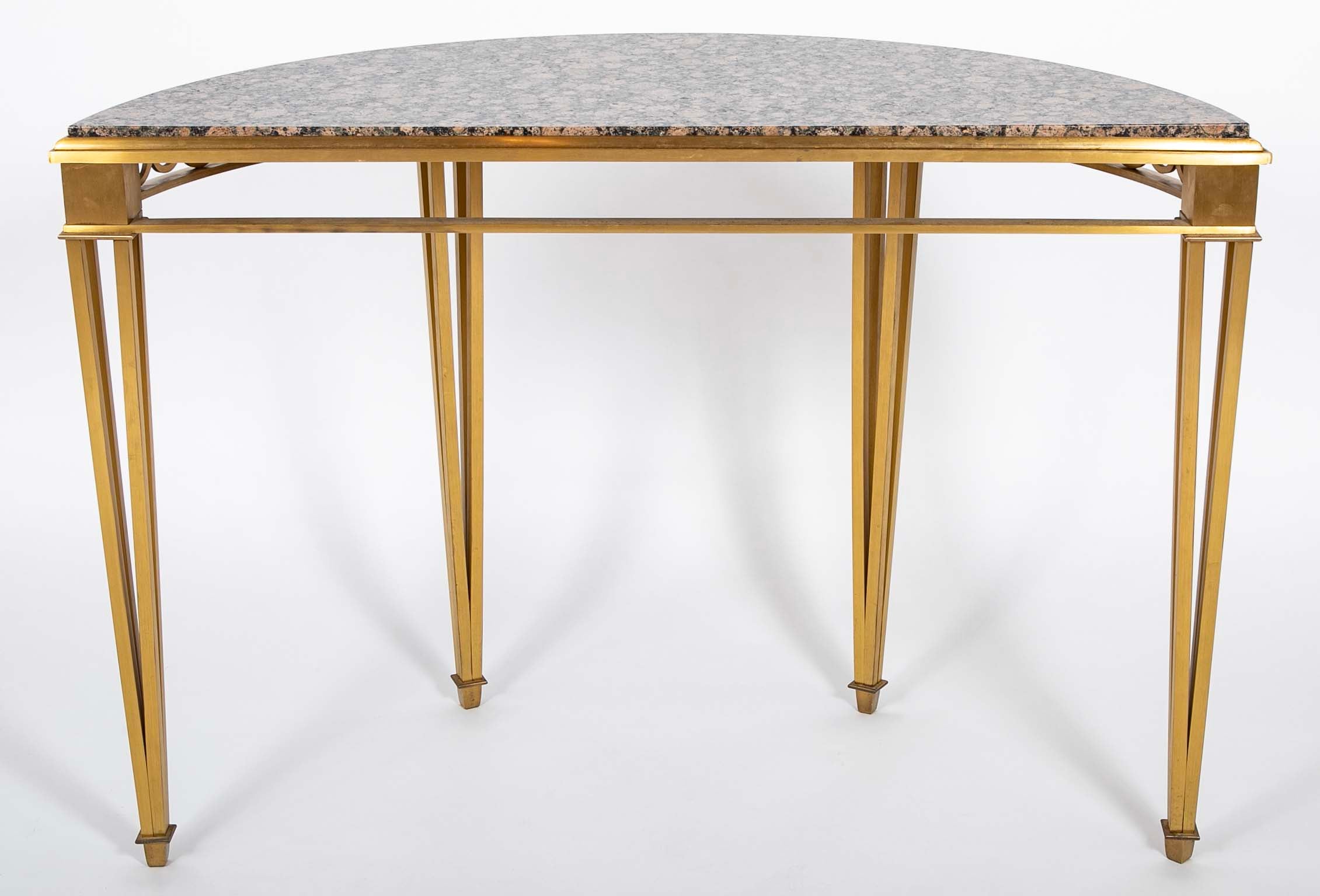 Striking Pair of Bronze Consoles with Fossilized Marble Tops