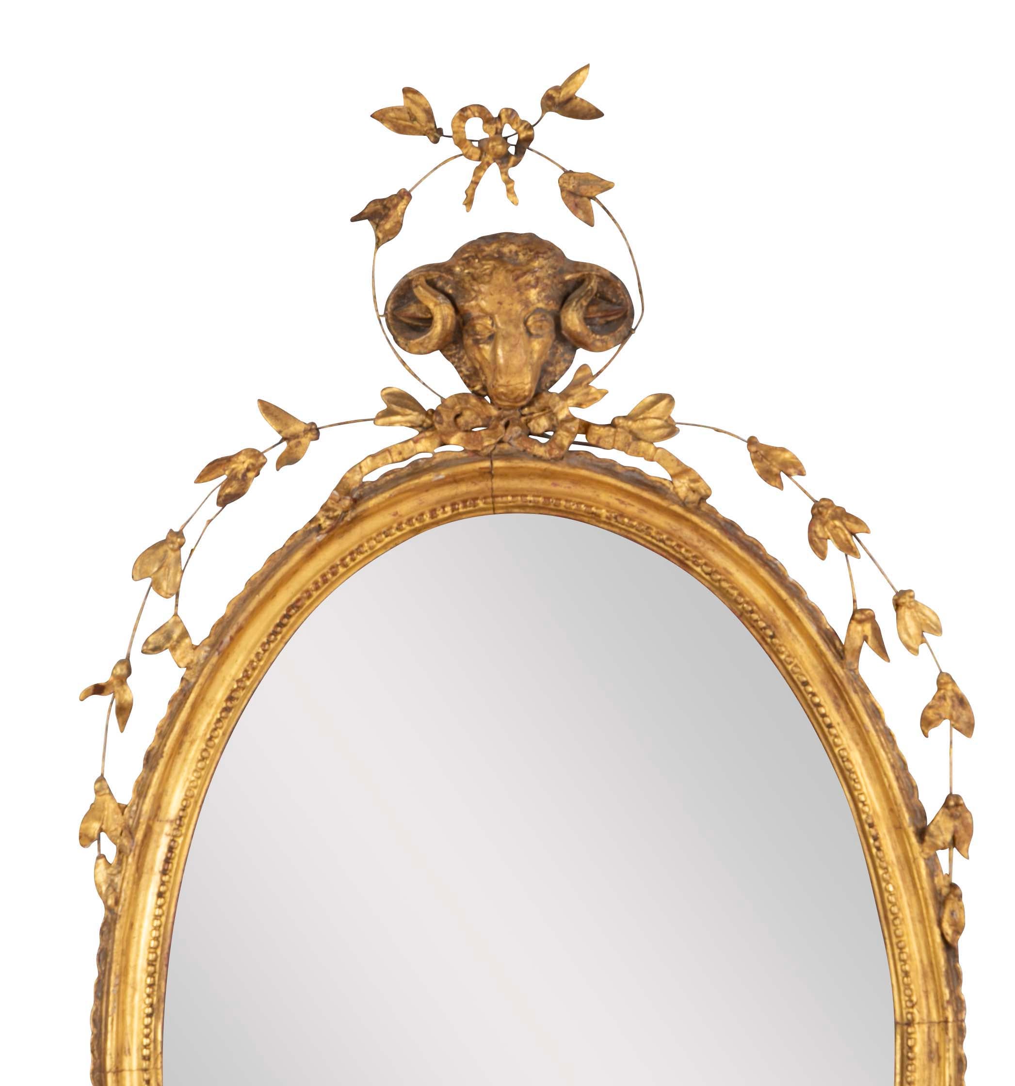 English George III Oval Hepplewhite Gilded Mirror with Ram's Head Surmount