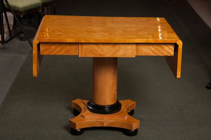 A Handsome Biedermeier Satinwood Sofa Table