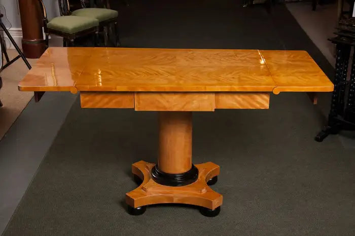 A Handsome Biedermeier Satinwood Sofa Table
