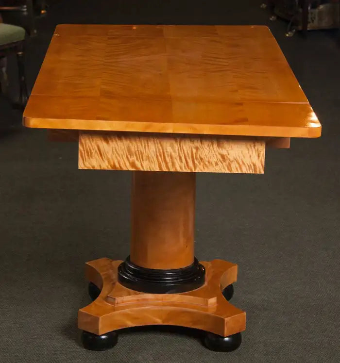 A Handsome Biedermeier Satinwood Sofa Table