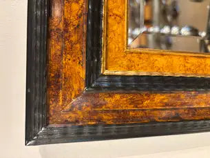 Dutch Baroque Style Ebonized Gilt Ripple Mold Framed Mirror with Beveled Glass