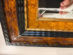 Dutch Baroque Style Ebonized Gilt Ripple Mold Framed Mirror with Beveled Glass