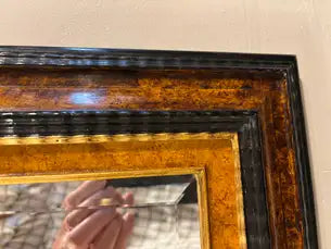 Dutch Baroque Style Ebonized Gilt Ripple Mold Framed Mirror with Beveled Glass