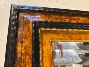 Dutch Baroque Style Ebonized Gilt Ripple Mold Framed Mirror with Beveled Glass