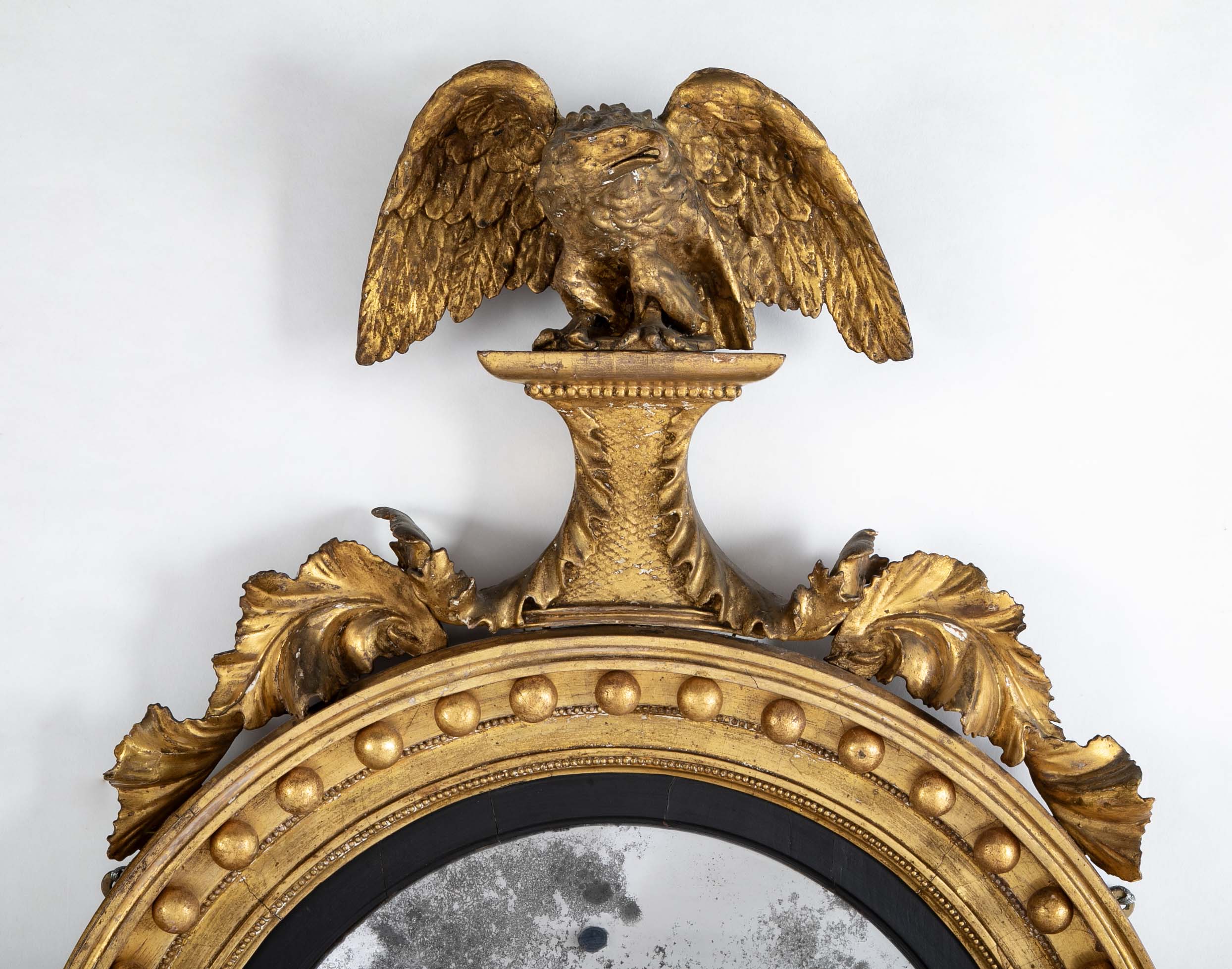 19th Century English Regency Gilt Wood Convex Mirror with Carved Eagle