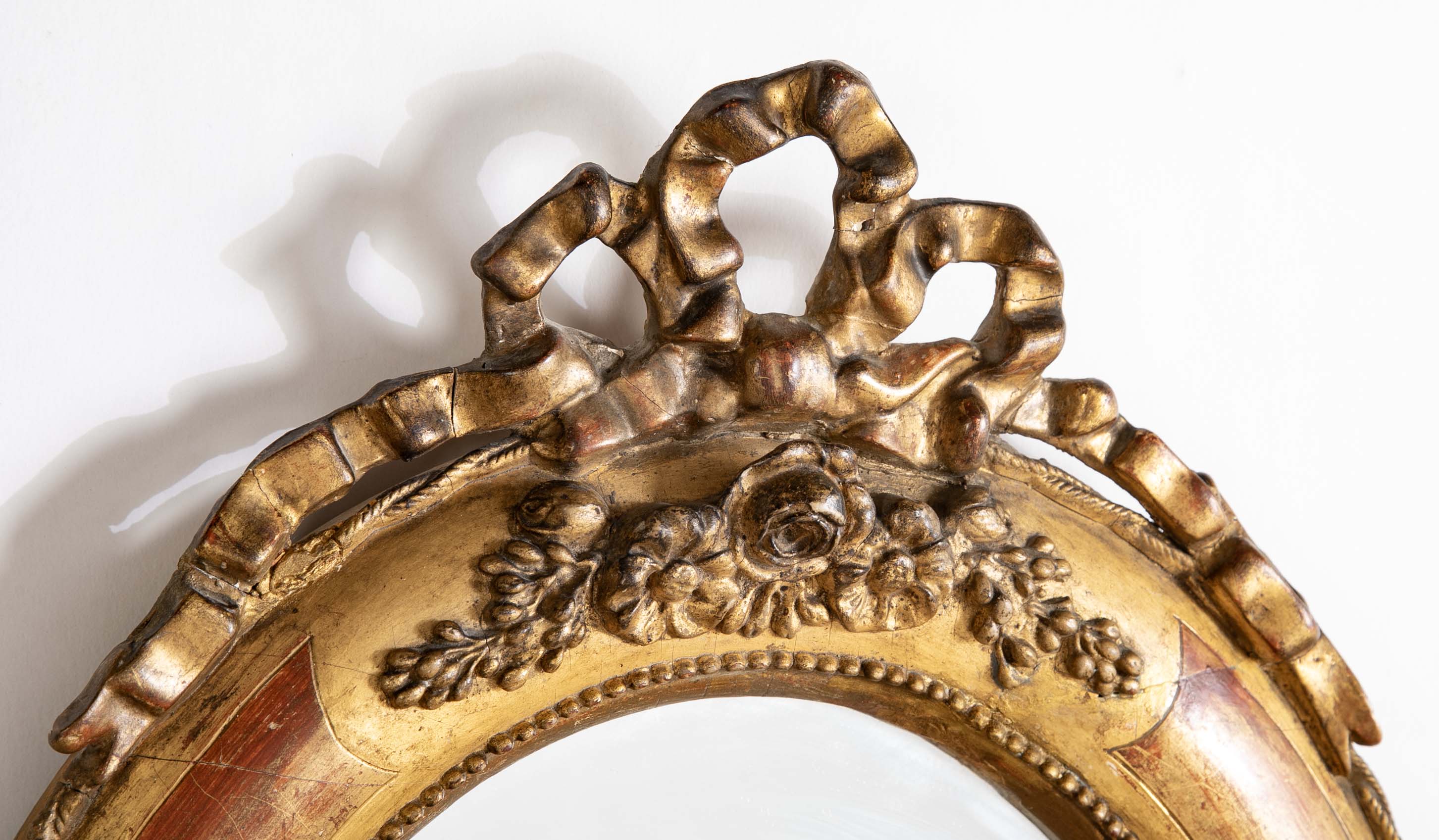 18th Century Italian Rococo Gilt Wood Oval Mirror