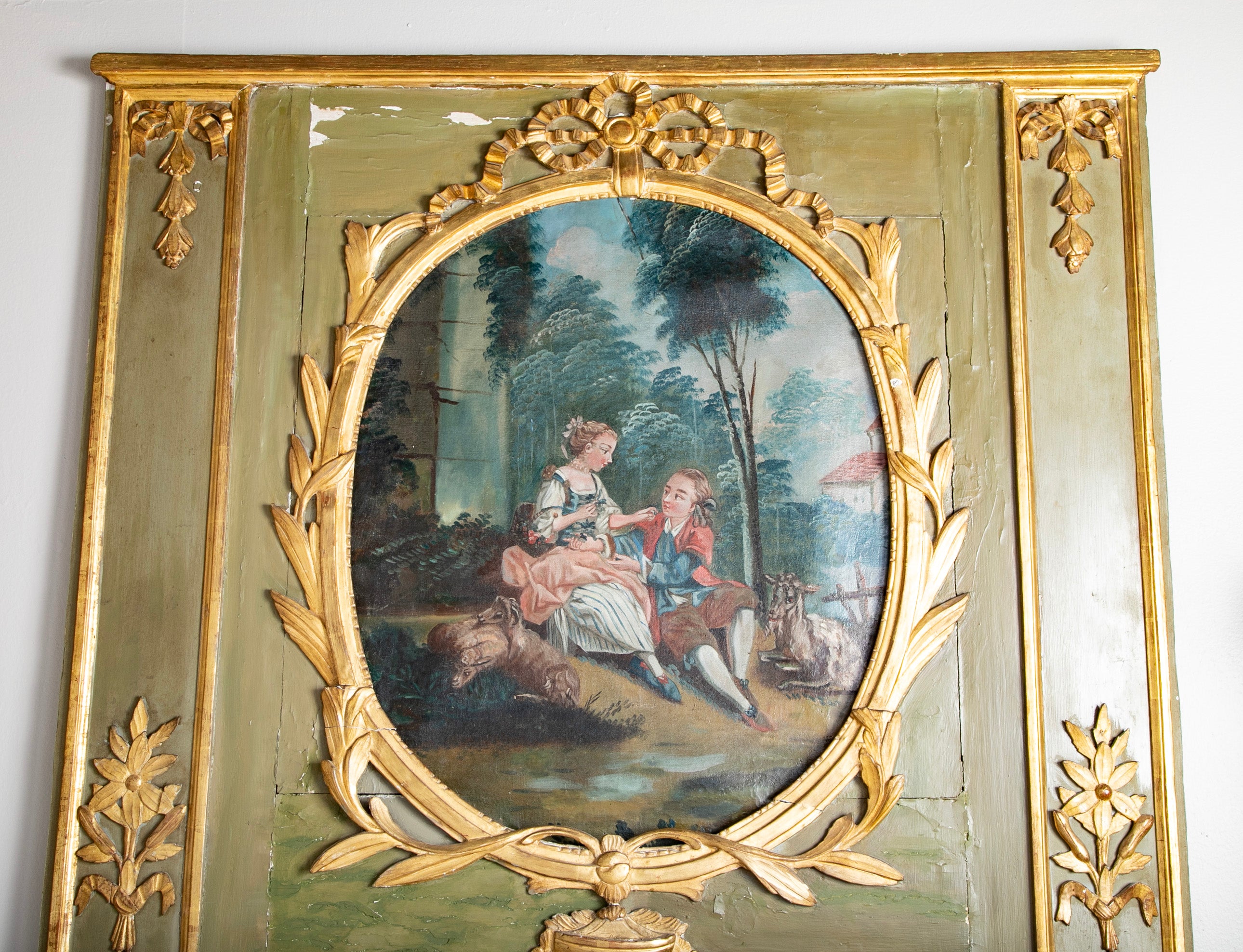 An 18th Century French Trumeau with Oil Painting of a Man and Woman in a Forest