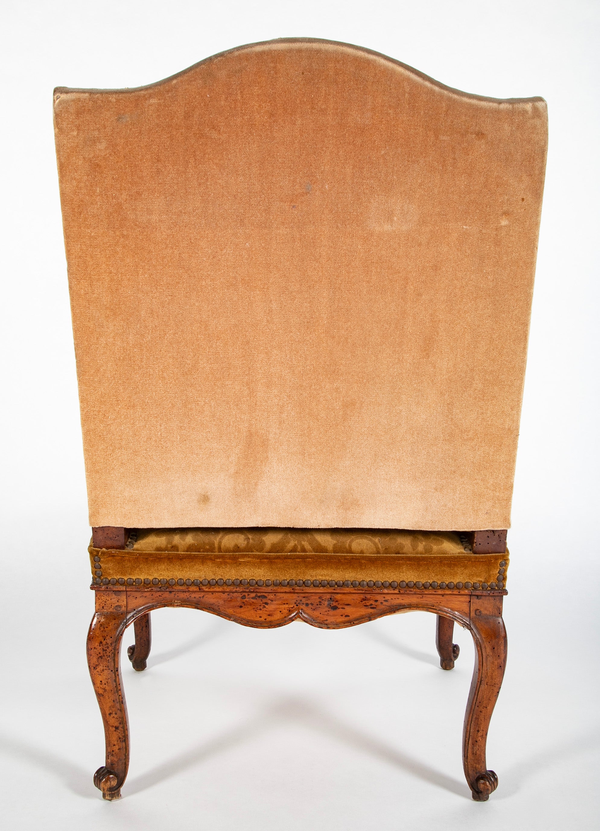 A Pair of French Carved Walnut Louis XIV Armchairs