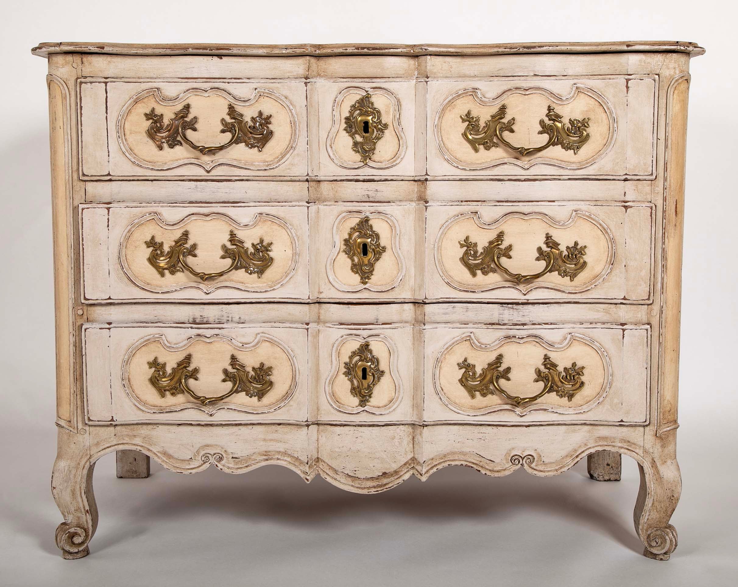 An 18th Century Robust French Provincial Serpentine Front Commode