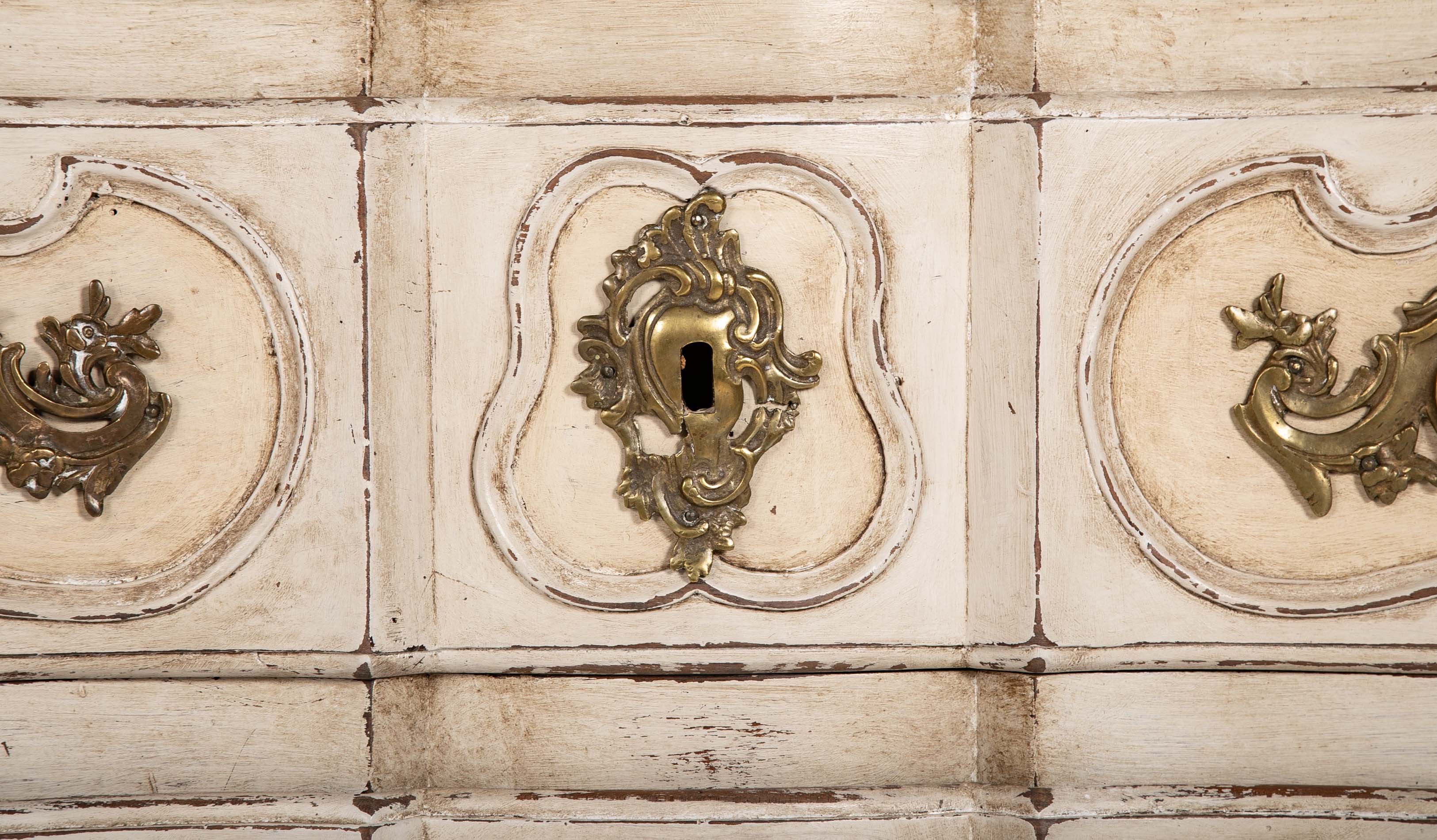 An 18th Century Robust French Provincial Serpentine Front Commode