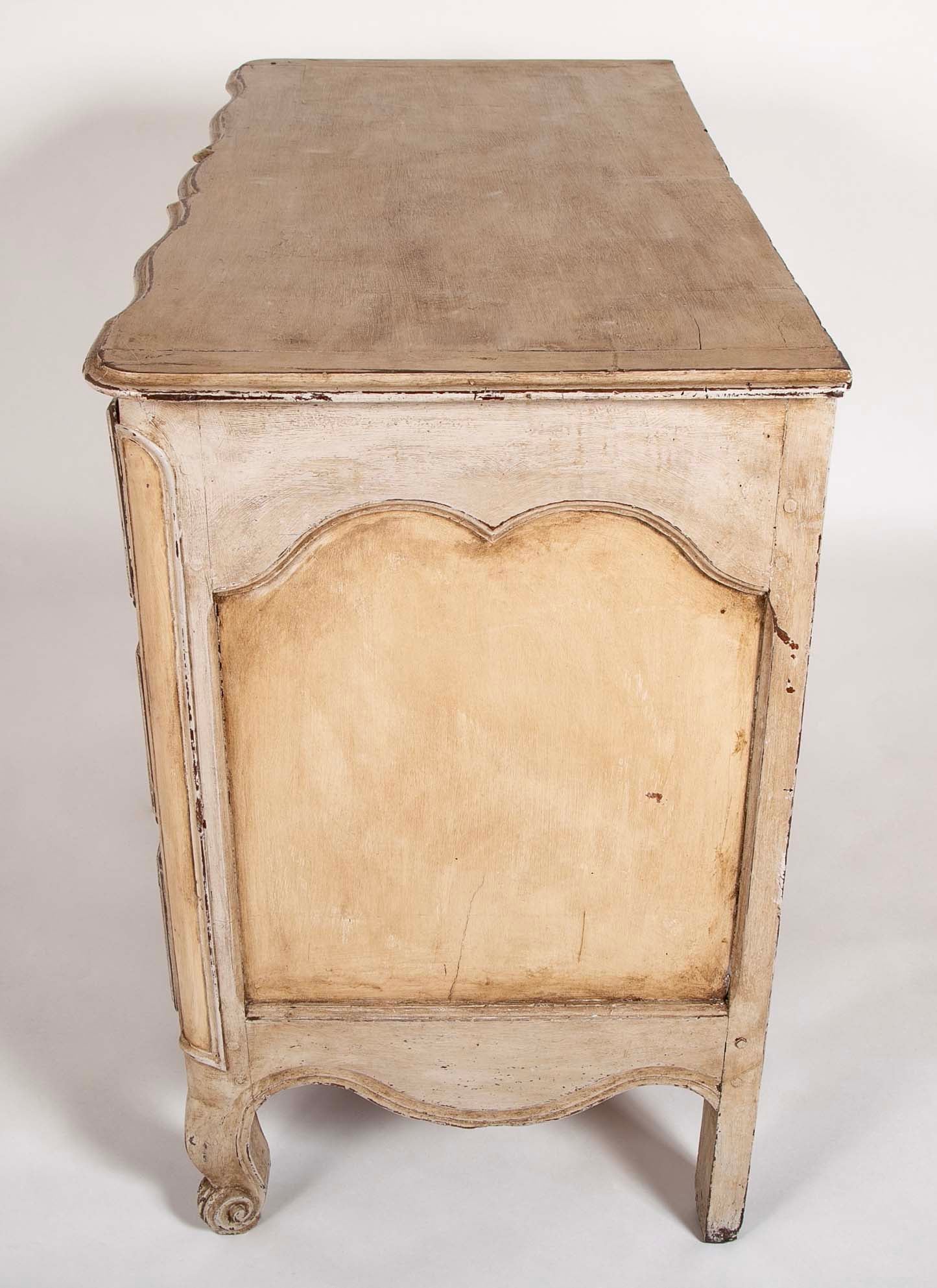 An 18th Century Robust French Provincial Serpentine Front Commode