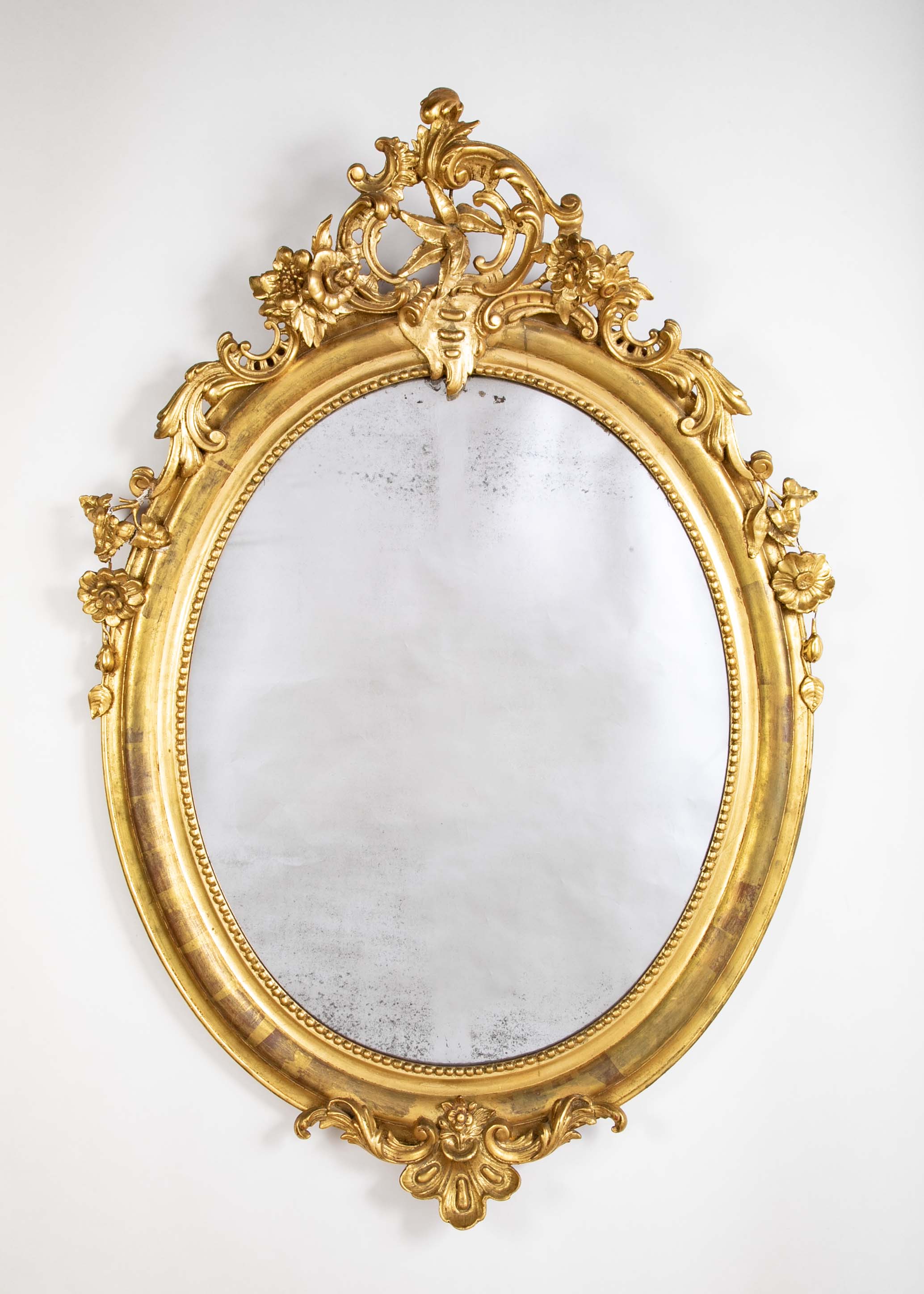 An 18th Century French Carved & Gilt Oval Mirror