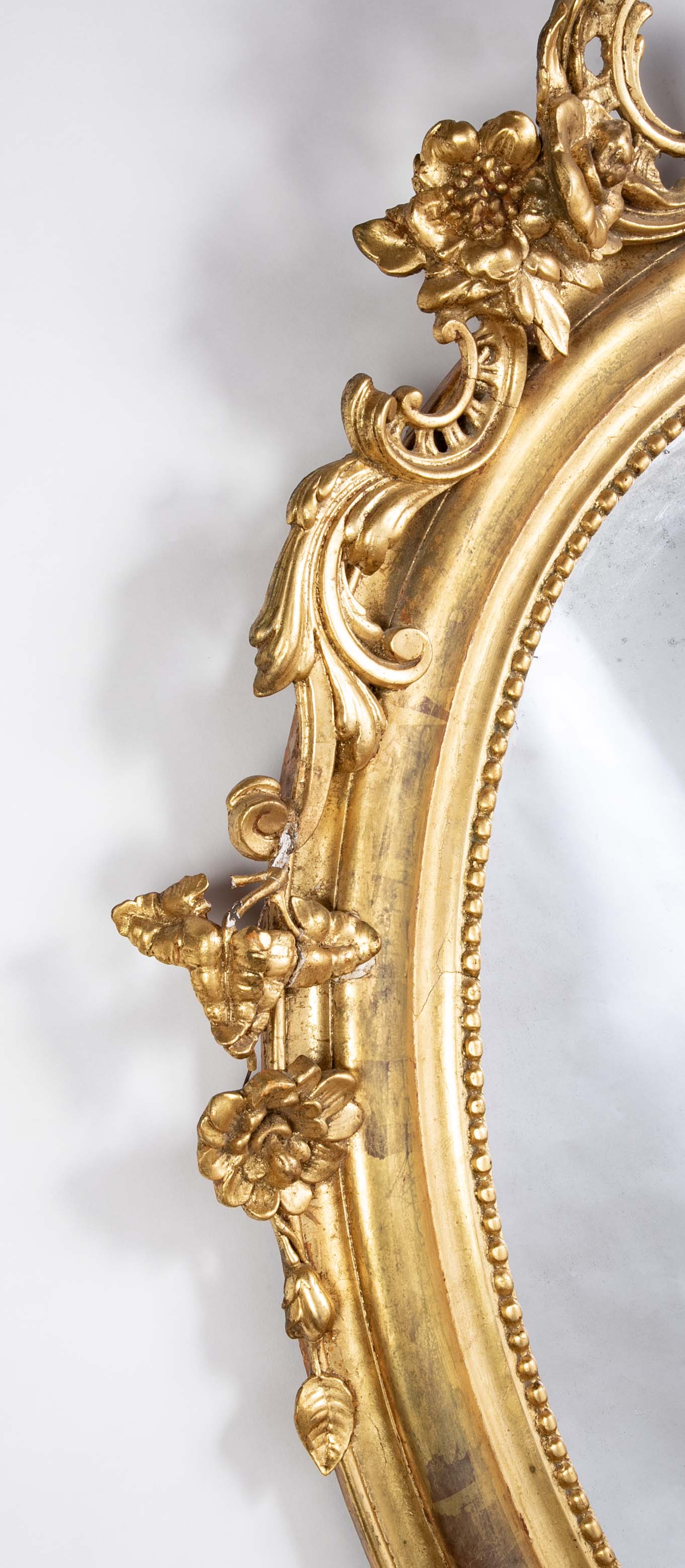 An 18th Century French Carved & Gilt Oval Mirror