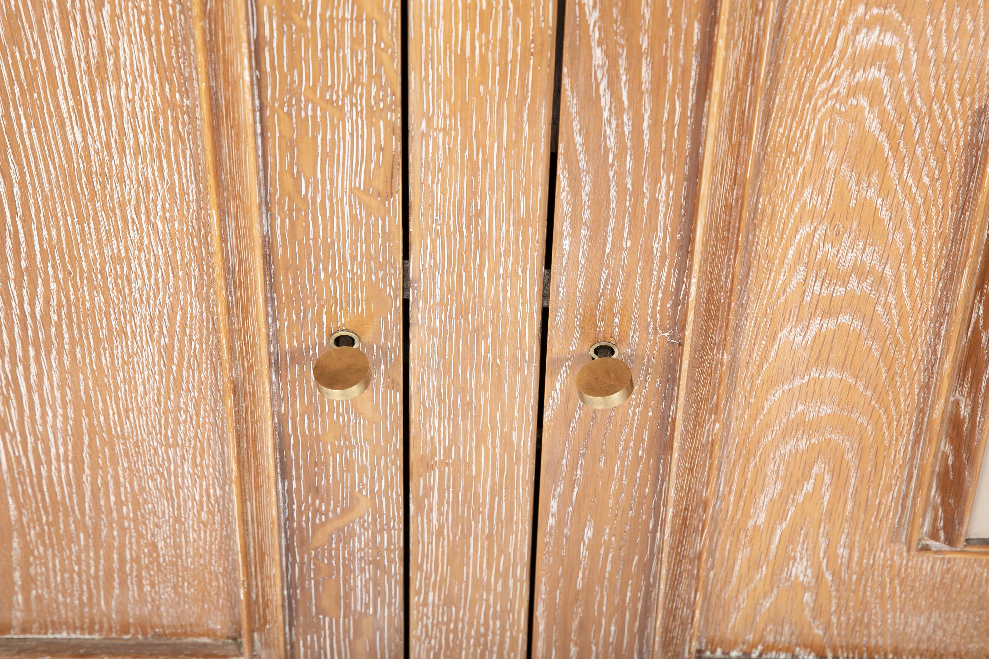 A Cerused Oak Credenza in the Manner of Andre Arbus