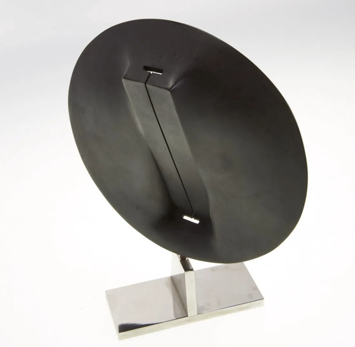 A Bronze and Chrome Sculpture by James Wines