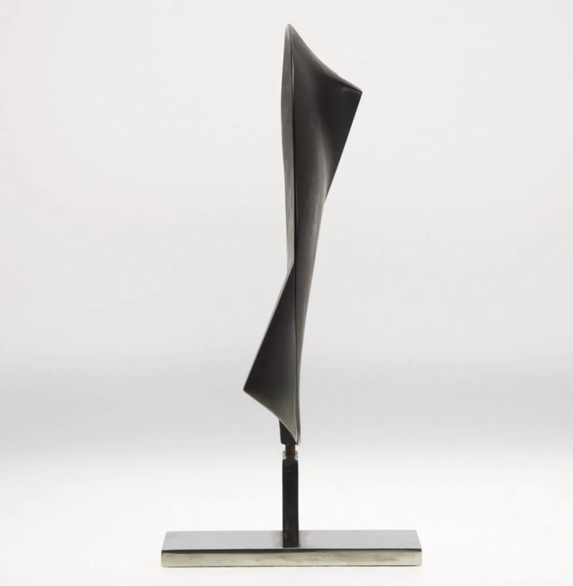A Bronze and Chrome Sculpture by James Wines