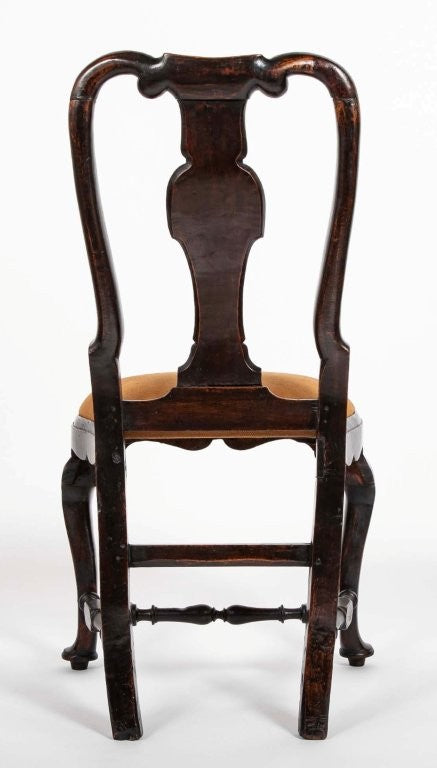 A set of 10 Queen Anne Black Painted Dining Chairs