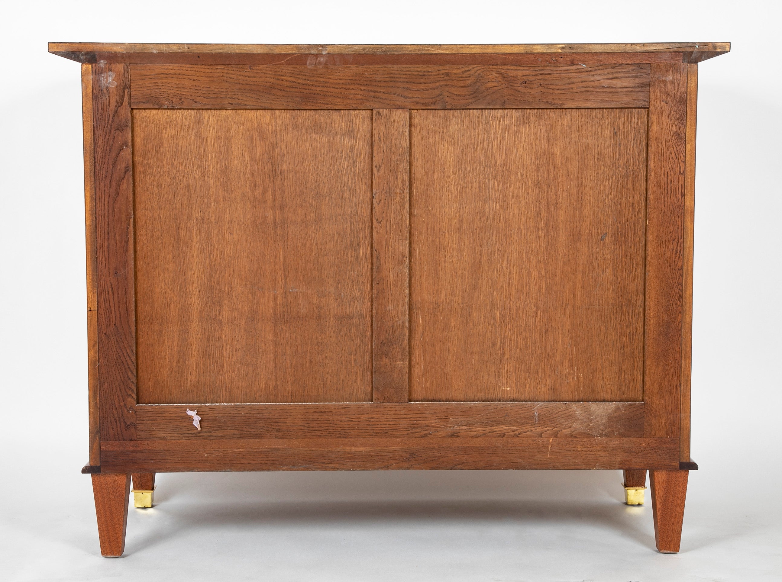 A Three Drawer Rosewood Commode in the Manner of Jacques Adnet